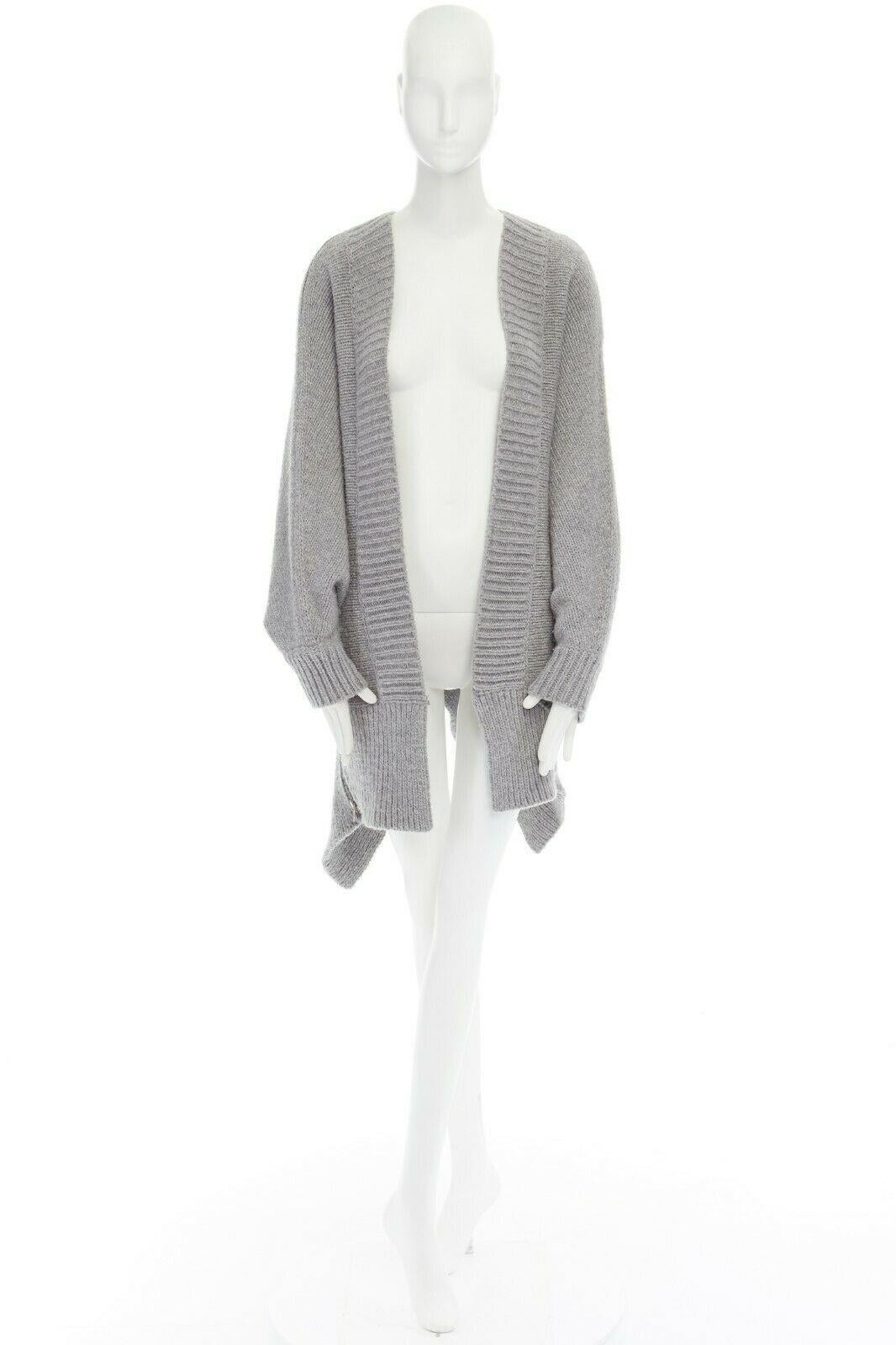 ALEXANDER WANG grey merino wool blend chunky knit zipped trimmed cardigan XS

ALEXANDER WANG
Merino wool, nylon. Light grey. Ribbed open front. Single hook and eye front closure. Rounded shoulder. Extreme wide sleeves. RIbbed cuff. Silver tone