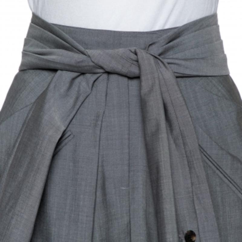 Presenting fine tailoring signs, a tapered silhouette, and neat folds, these Alexander Wang pants are visually appealing and highly comfortable. The pair is designed to look like a blazer's sleeves are tied around your waist.