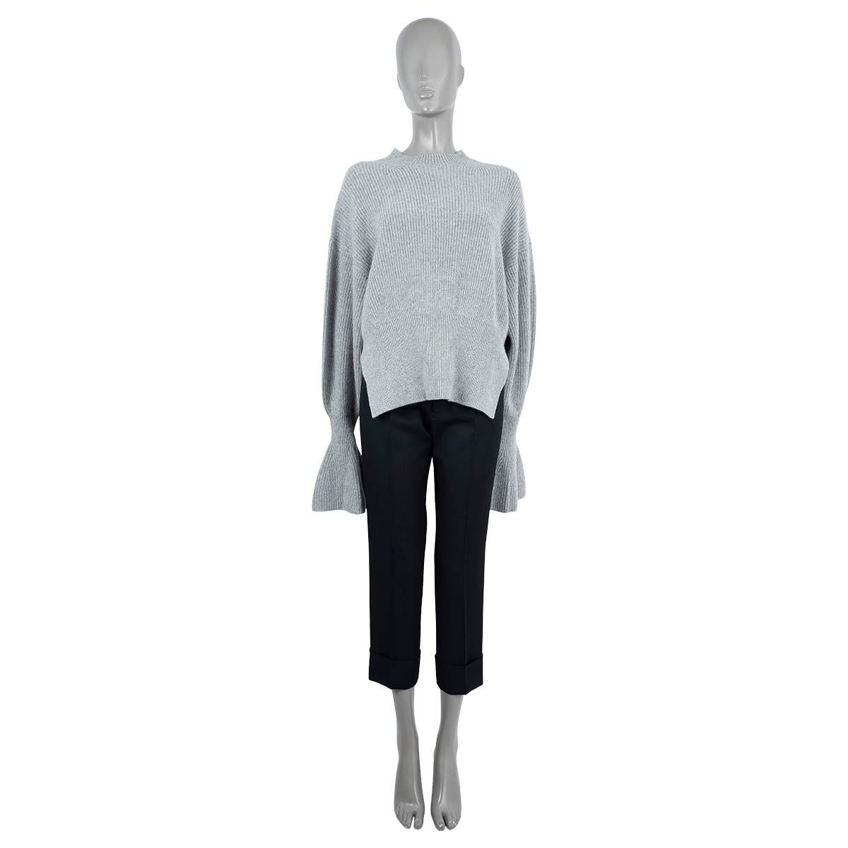 100% authentic Alexander Wang rib-knit sweater in heather grey wool (61%), viscose (31%) and cashmere (8%). Featuring a mock neck, split hem and gathered and fluted long sleeves. Has been worn and is in excellent condition.

Measurements
Tag