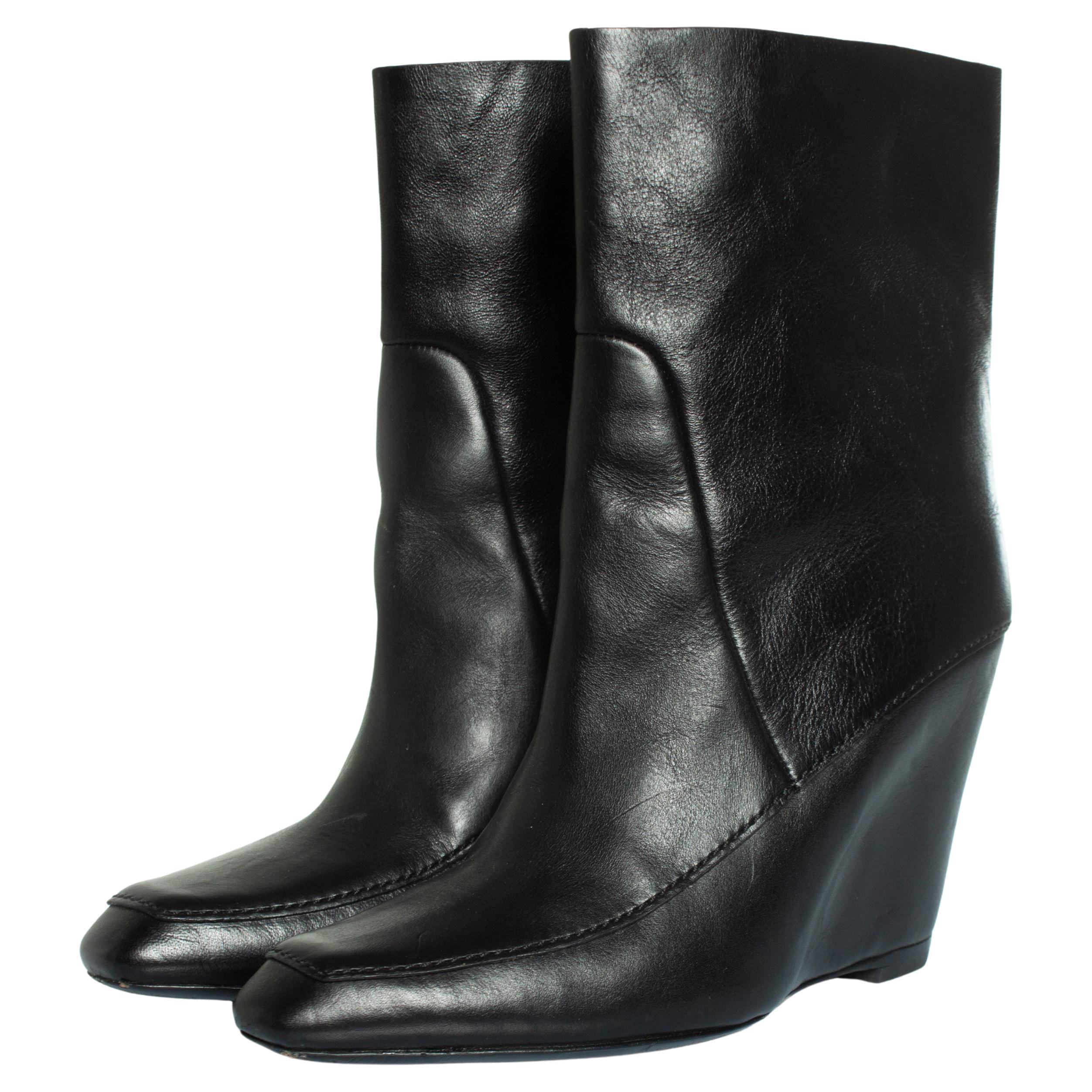 Alexander Wang, hidden platform ankle boots in black