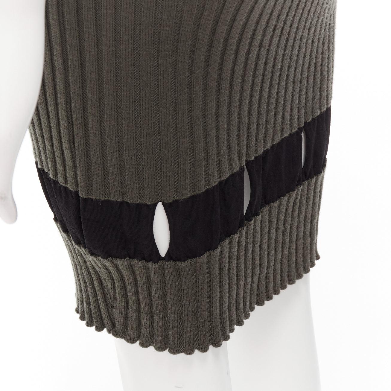ALEXANDER WANG khaki black ribbed cut out pencil knee skirt XS
Reference: YIKK/A00071
Brand: Alexander Wang
Designer: Alexander Wang
Material: Fabric
Color: Khaki, Black
Pattern: Solid
Closure: Elasticated
Made in: Italy

CONDITION:
Condition: