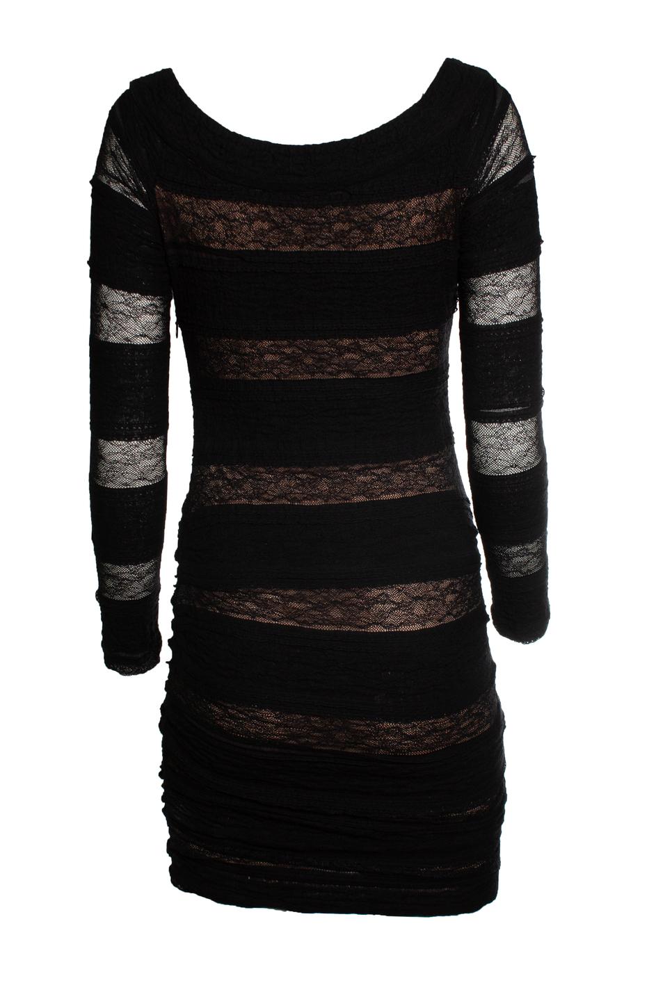 Alexander Wang, lace dress in black with stretch. The item is in very good condition. 

CONDITION: very good condition

SIZE: 4 - S

MEASUREMENTS: length 86 cm, bust 40 cm, waist 30 cm, shoulder width 46 cm, sleeve length 52 cm

MATERIAL: no