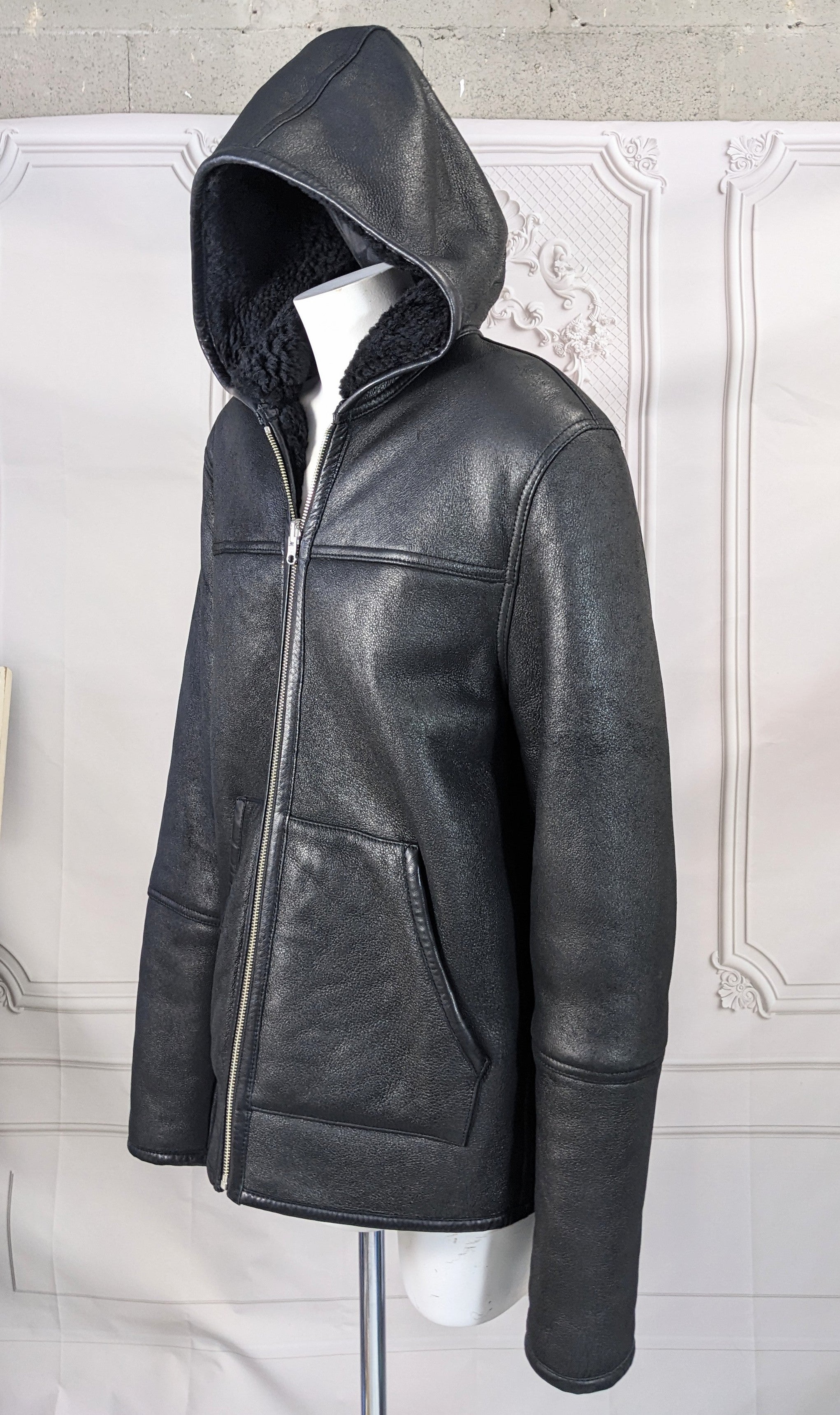 Alexander Wang Unisex Lamb Shearling Hoodie from the 2000's. Wang's remake of an elevated classic with an urban NY twist. A hoodie executed in the most luxurious shearling with piped detailing. Front zip entry,  Fits Mens Medium, Womens Large. 