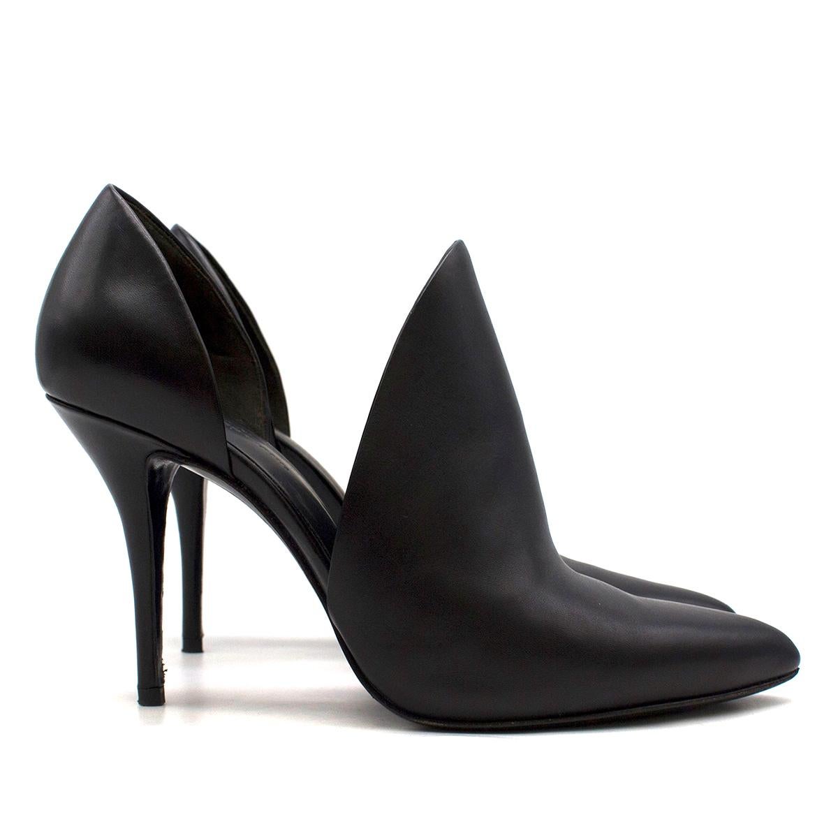 Alexander Wang Leva D'Orsay Leather Pumps in Black

- Black leather pump
- Slip on style
- Pointed toe
- 90mm stiletto heel
- Black leather lining with logo embroidered
- Black leather sole

Please note, these items are pre-owned and may show some
