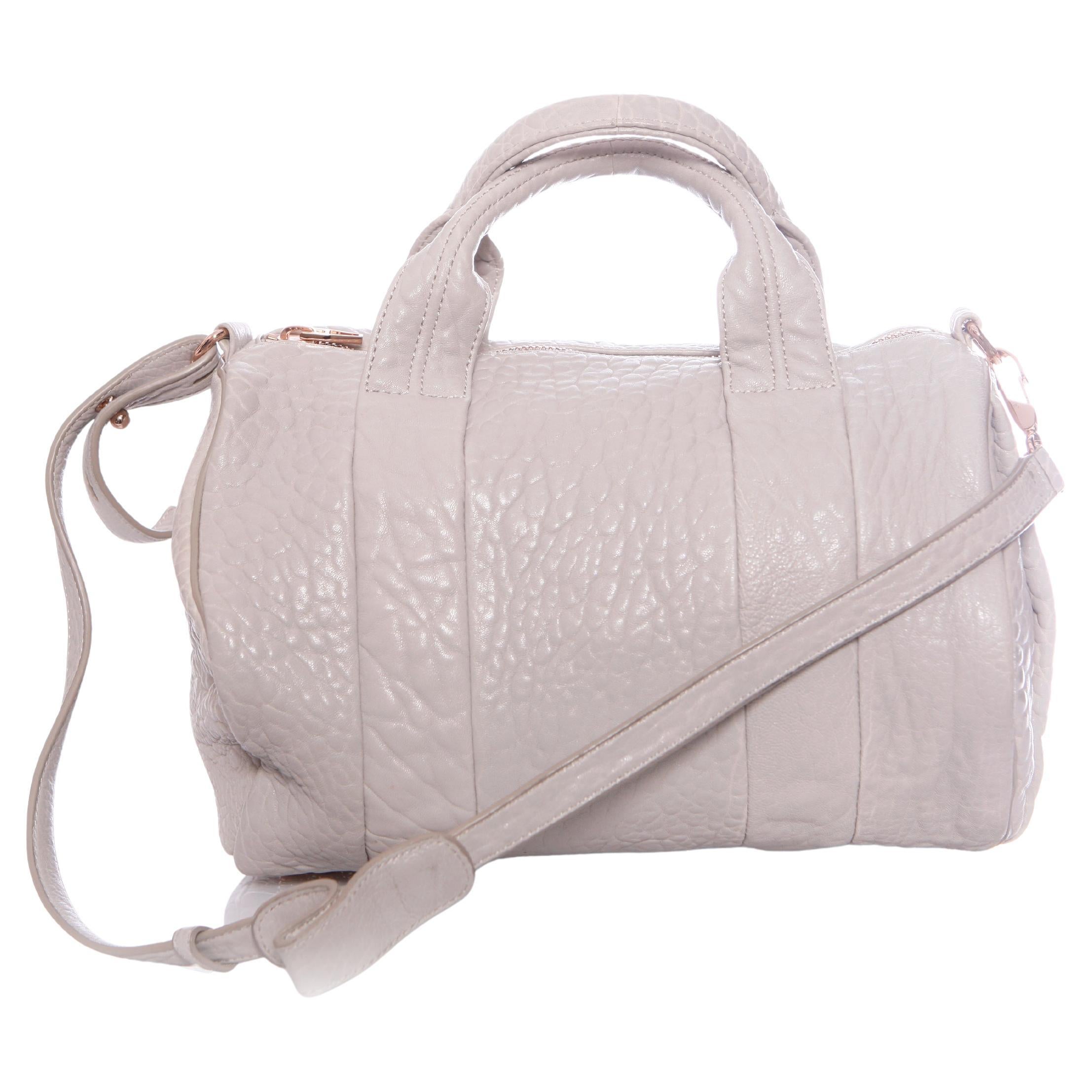 Alexander Wang, light grey rockie bag with rose coloured studs. For Sale