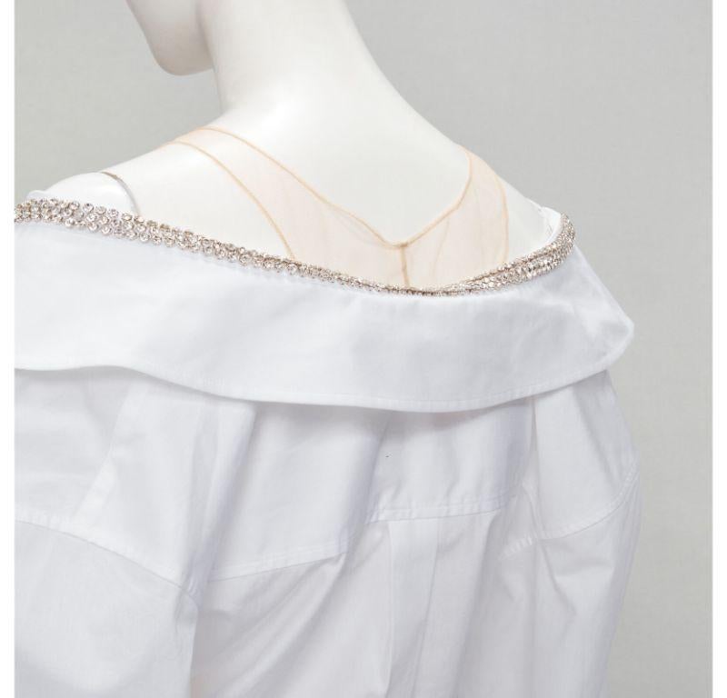 ALEXANDER WANG nude yoke white crystal embellished off shoulder cropped shirt S
Reference: ANWU/A00508
Brand: Alexander Wang
Designer: Alexander Wang
Material: Feels like cotton
Color: White
Pattern: Solid
Closure: Button
Lining: Unlined
Extra