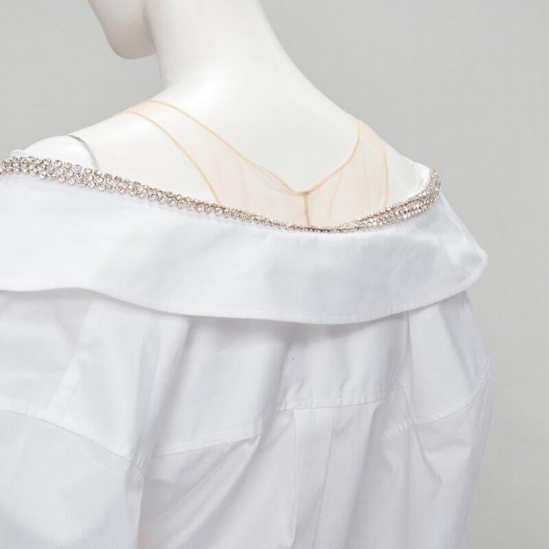 ALEXANDER WANG nude yoke white crystal embellished off shoulder cropped shirt S
Reference: ANWU/A00508
Brand: Alexander Wang
Designer: Alexander Wang
Material: Feels like cotton
Color: White
Pattern: Solid
Closure: Button
Lining:  Unlined
Extra