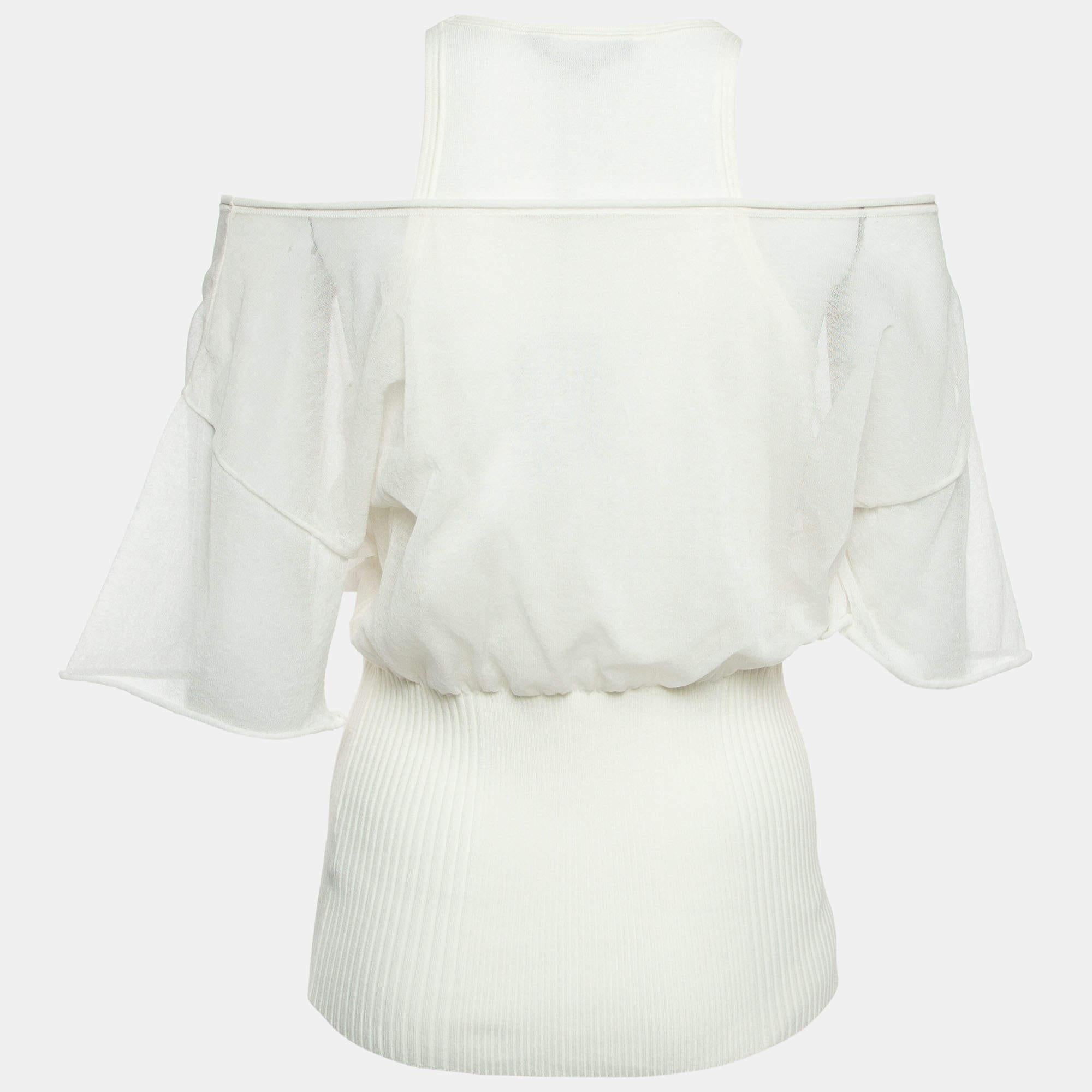 Careful tailoring, quality materials, and elegant cuts make this designer top a piece to cherish! It comes in a classic design to be easy to style.

Includes: Brand Tag