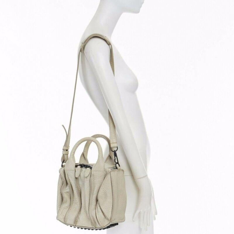 ALEXANDER WANG Rockie grey pebble leather black stud base small duffel bag
Reference: TGAS/A02904
Brand: Alexander Wang
Designer: Alexander Wang
Material: Leather
Color: Grey
Pattern: Solid
Closure: Zip
Extra Details: Rockie Duffel. Light grey