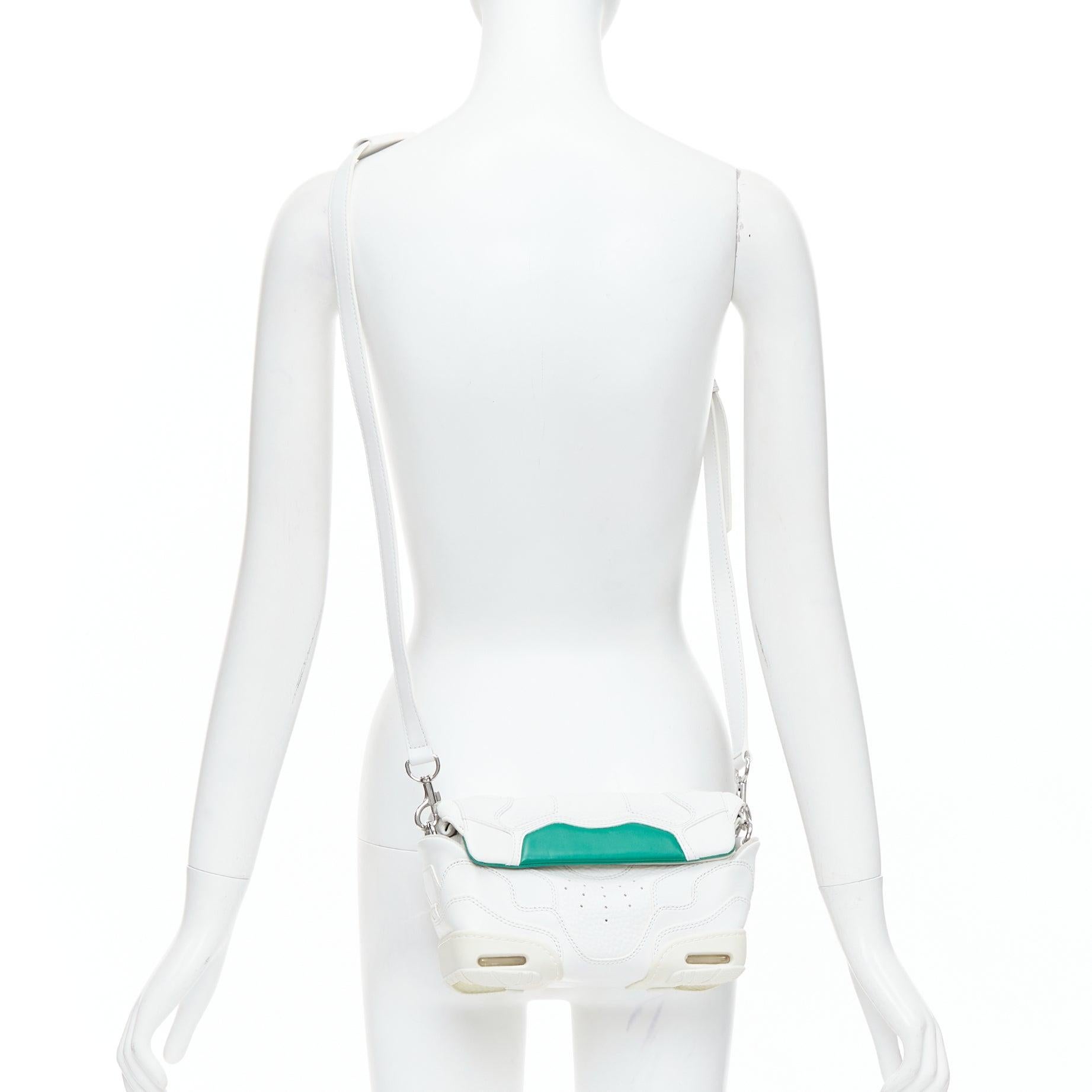 ALEXANDER WANG Runway Sneaker white green leather clutch crossbody bag
Reference: NKLL/A00485
Brand: Alexander Wang
Designer: Alexander Wang
Model: Sneaker
Material: Leather
Color: Green, White
Pattern: Solid
Closure: Magnet
Lining: Grey