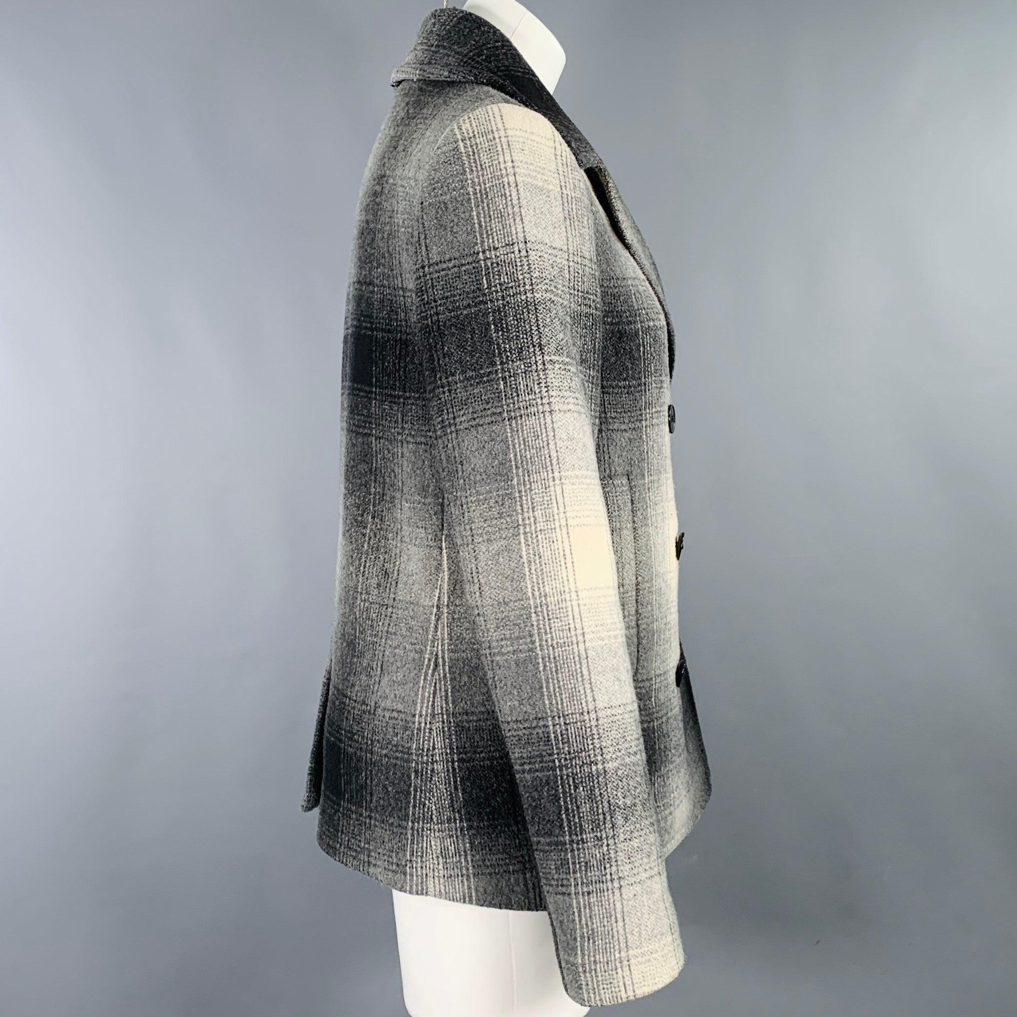 ALEXANDER WANG jacket
in a grey, black, and white wool blend featuring a plaid pattern,
double breasted style, and three button closure. Very Good Pre-Owned Condition. Minor pilling. 

Marked:   0 

Measurements: 
 
Shoulder: 14.5 inches Bust: 37