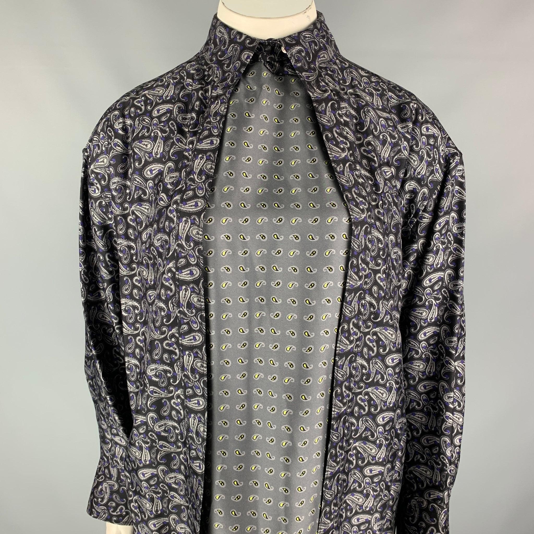ALEXANDER WANG shirt comes in a navy & grey paisley silk featuring a layered tank design, top single button closure, single patch pocket, and a open front.
New With Tags.  

Marked:   10 

Measurements: 
 
Shoulder: 23 inches  Bust: 42 inches 