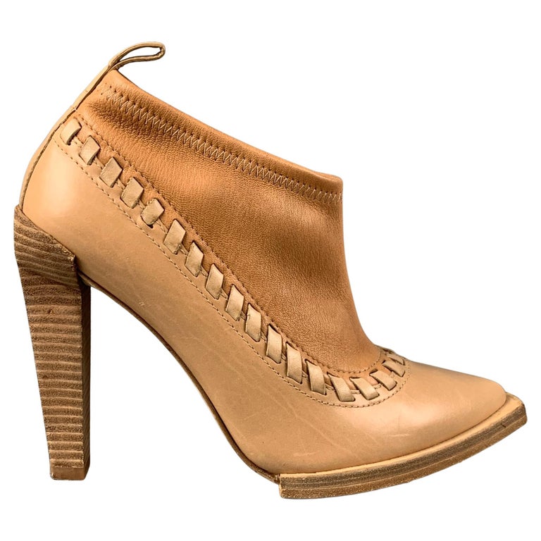ALEXANDER WANG Size 8 Tan Leather Two Tone Pointed Toe Auguste Boots For  Sale at 1stDibs | alexander wang feather boots, alexander wang brown, alexander  wang piercing heels