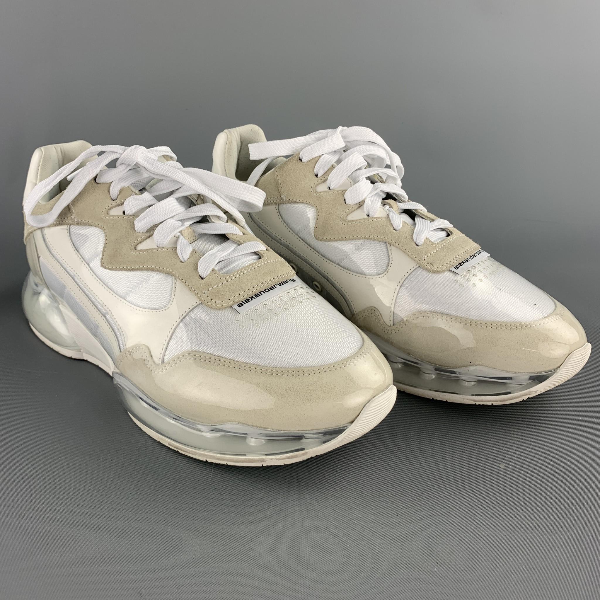 ALEXANDER WANG sneakers comes in a white mixed materials with a suede trim featuring a lace up style and a clear rubber sole. Minor spots. As-Is. Made in Italy.

Good Pre-Owned Condition.
Marked: 42.5

Outsole:

11.5 in. x 4 in.

