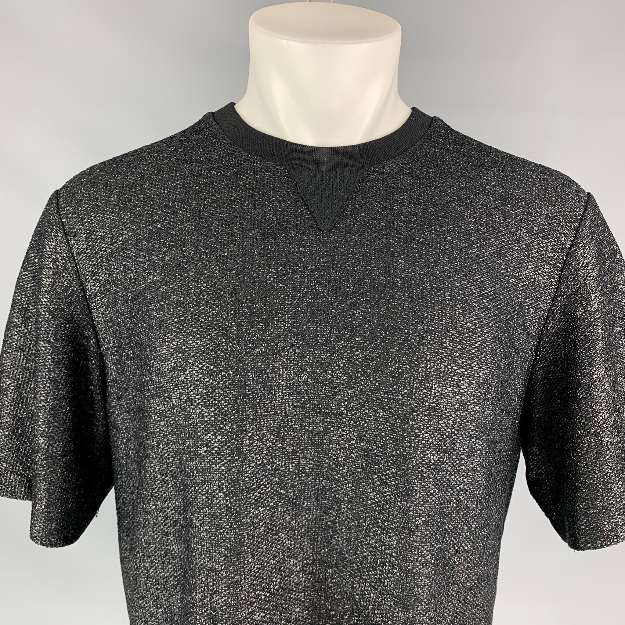 ALEXANDER WANG t-shirt comes in a black textured cotton / polyamide featuring a back ribbon trim and a crew-neck. 

Very Good Pre-Owned Condition.
Marked: 50

Measurements:

Shoulder: 19.5 in.
Chest: 44 in.
Sleeve: 11.5 in.
Length: 30 in. 
SKU: