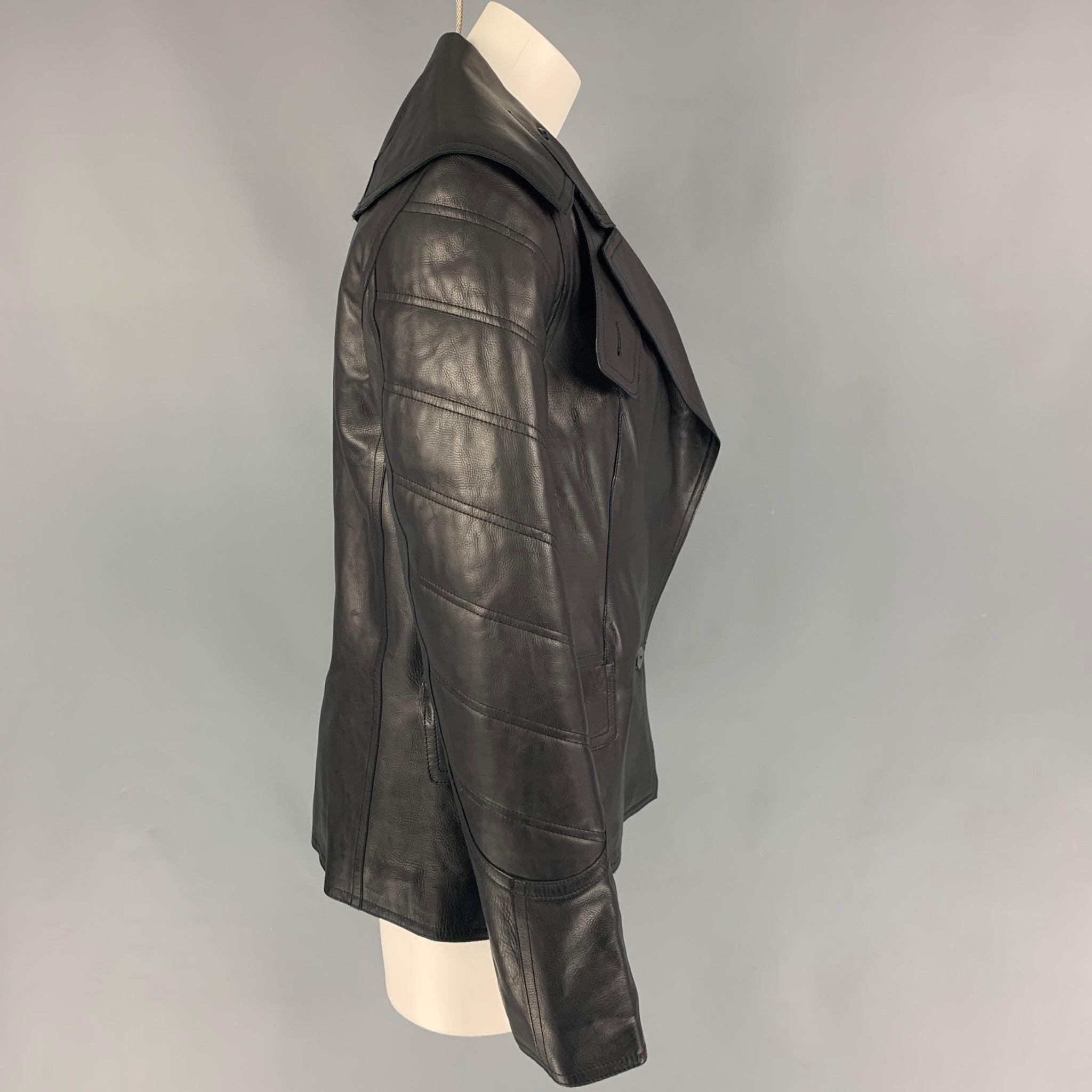 ALEXANDER WANG jacket comes in a black quilted calf skin leather featuring a large notch lapel, flap pockets, and a double button closure.
New With Tags.
 

Marked:   S 

Measurements: 
 
Shoulder: 16 inches  Bust: 34 inches  Sleeve: 23 inches 