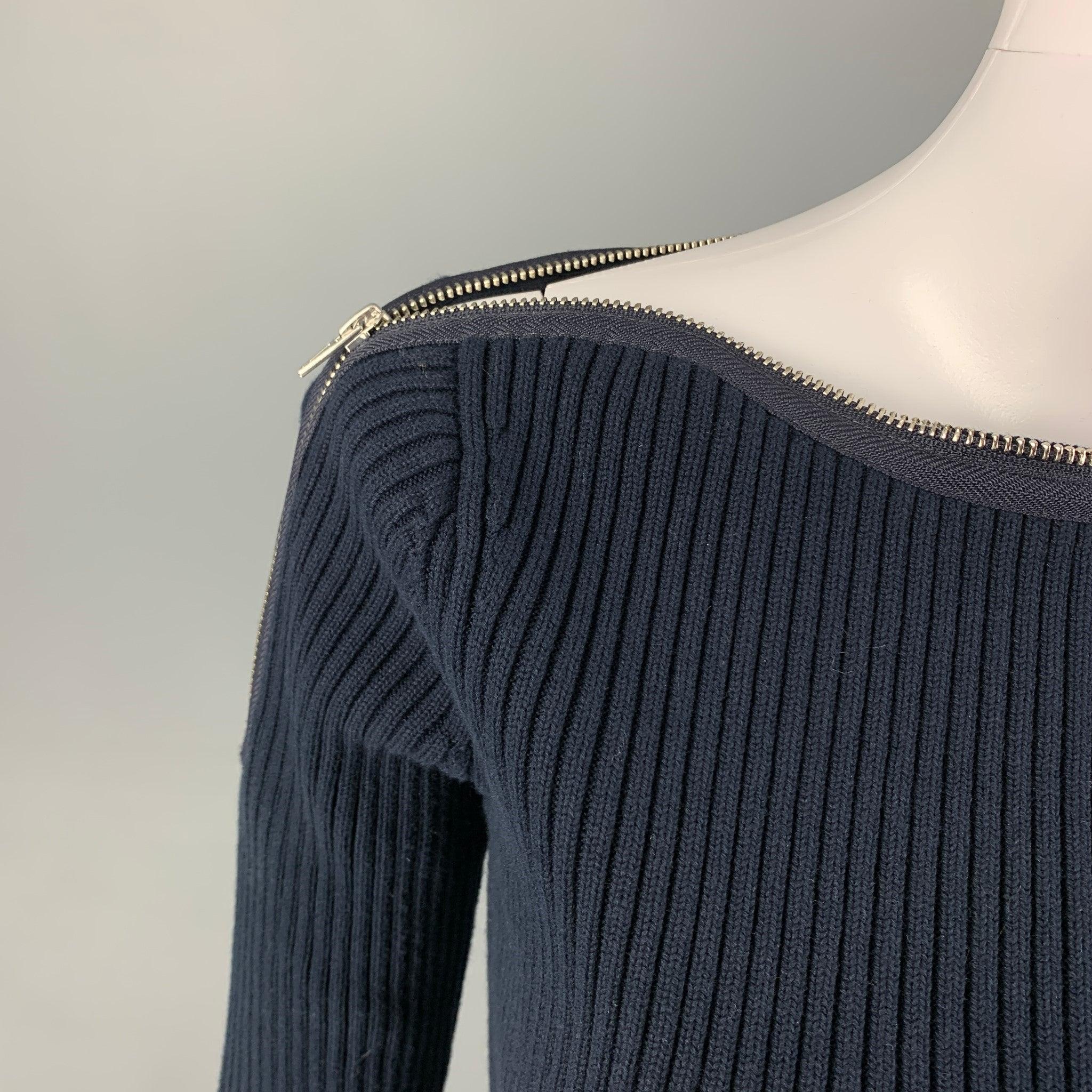 ALEXANDER WANG pullover comes in a navy ribbed cotton blend featuring long sleeves and a top zipper design. Excellent Pre-Owned Condition. 

Marked:   XS 

Measurements: 
 
Shoulder: 13.5 inches Bust: 30 inches Sleeve: 26 inches Length: 18 inches 
 