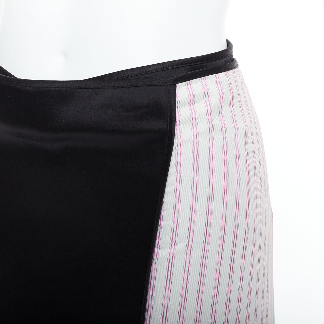 ALEXANDER WANG T black pink cream pinstripe wrap skirt US0 XS
Reference: KYCG/A00095
Brand: Alexander Wang T
Collection: T BY
Material: Triacetate, Blend
Color: Black, Pink
Pattern: Pinstriped
Closure: Wrap Tie
Made in: China

CONDITION:
Condition: