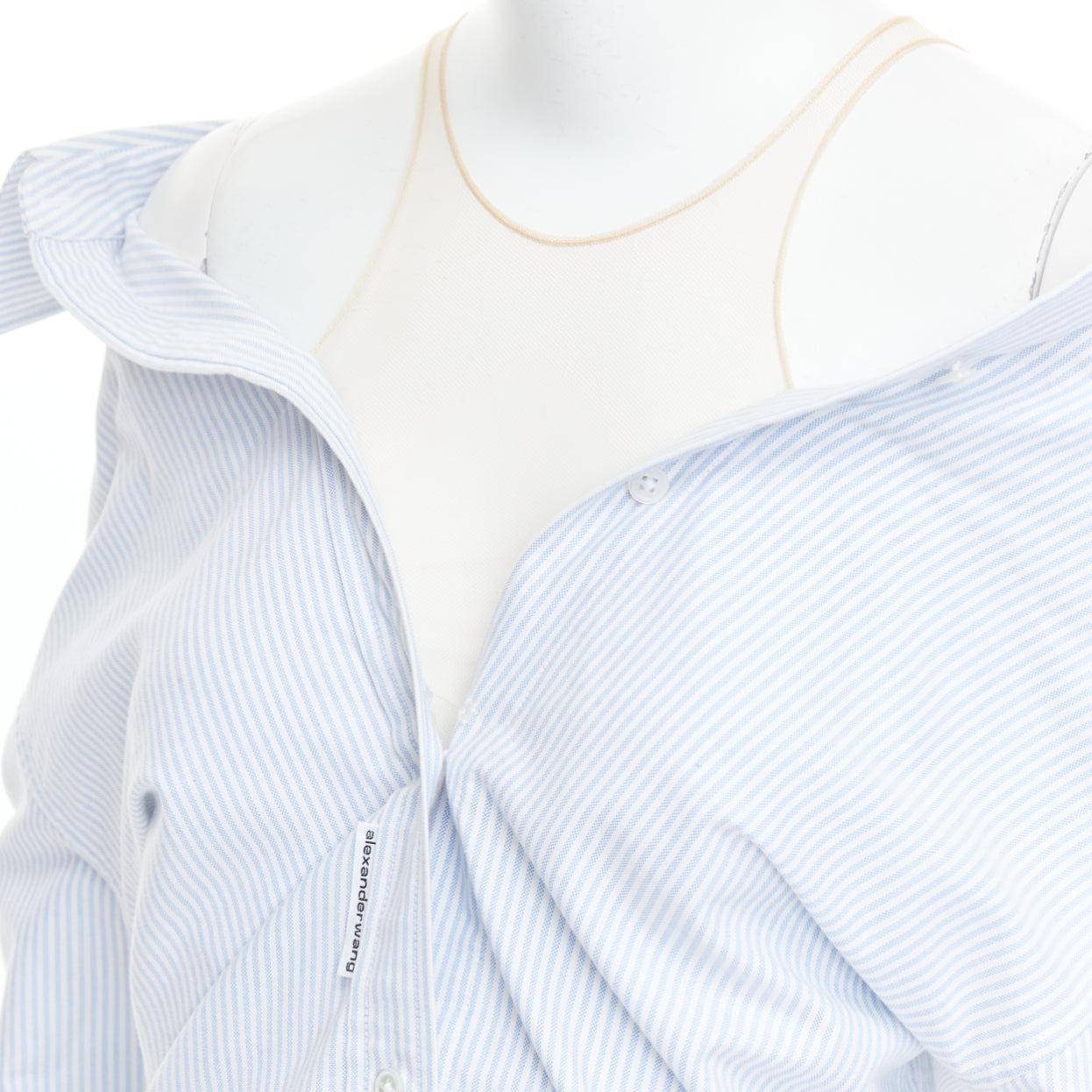 ALEXANDER WANG T blue striped Falling illusion deconstructed shirt XS
Reference: GEGG/A00132
Brand: Alexander Wang T
Designer: Alexander Wang
Collection: T
Material: Cotton, Polyester
Color: Blue, White
Pattern: Striped
Closure: Button
Extra