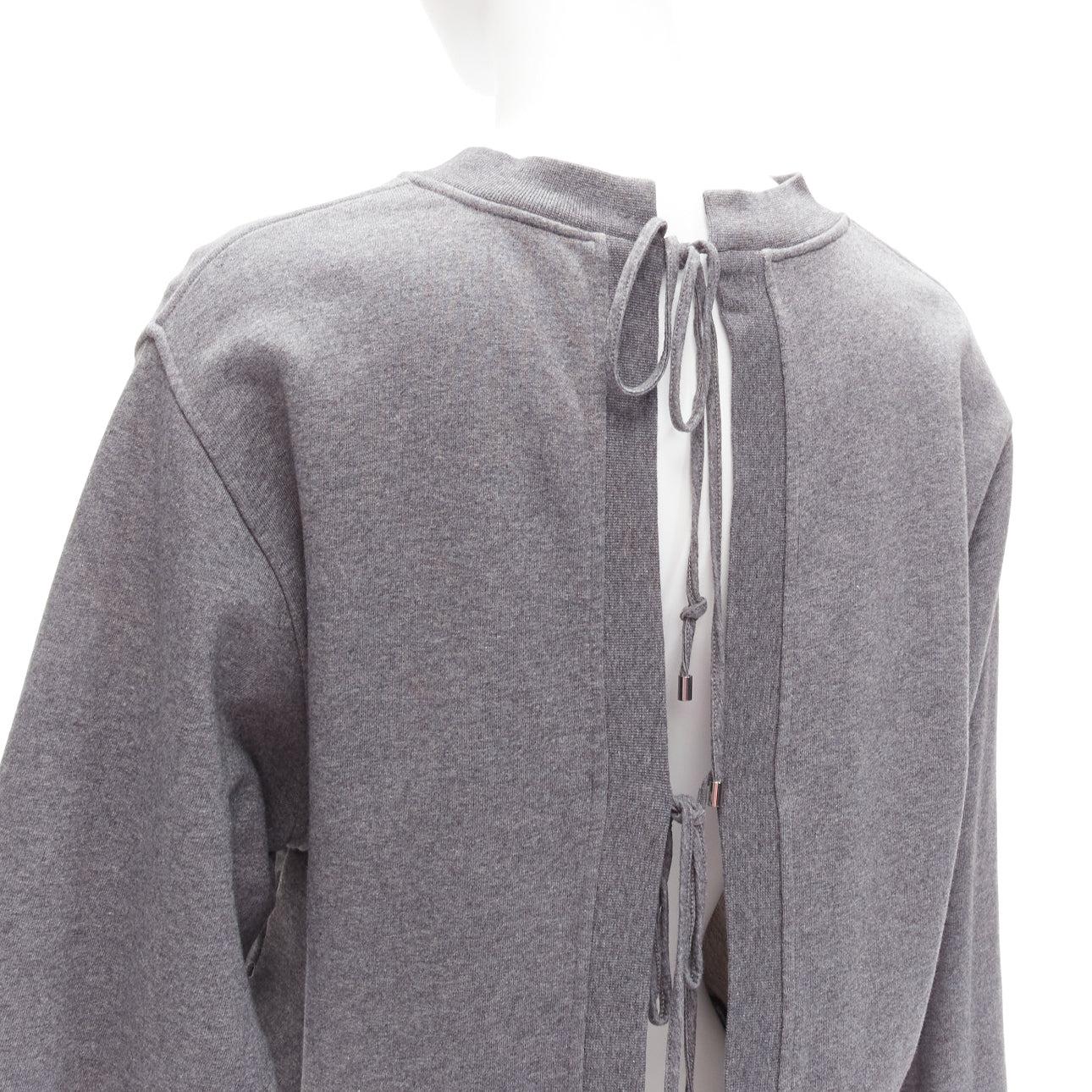 ALEXANDER WANG T grey cotton tie back cut out crew neck sweater S
Reference: JACG/A00115
Brand: Alexander Wang T
Collection: T
Material: Cotton
Color: Grey
Pattern: Solid
Closure: Self Tie
Extra Details: Self tie back and cut out design.
Made in: