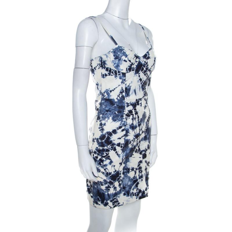 A stunning piece by Alexander Wang is this bustier dress. It is made from blue and white tie-dye lambskin leather. The sleeveless dress comes with a back zipper. Team it with boots and a watch.


