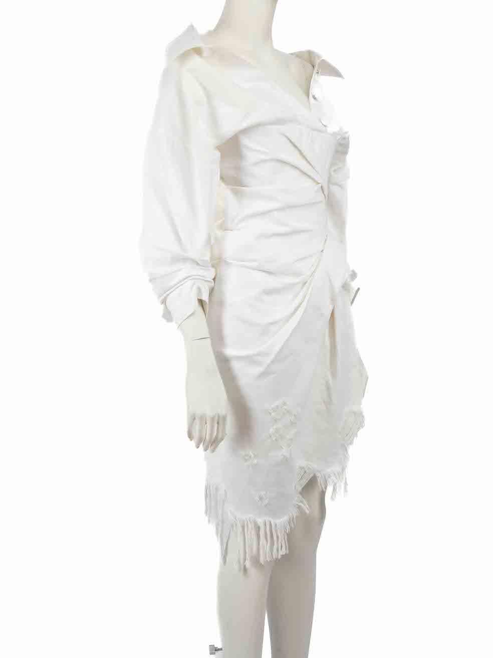 CONDITION is Good. Minor wear to dress is evident. Light wear to the front and the front lining with discoloured marks on this used Alexander Wang designer resale item.

Details
White
Cotton
Mini dress
Asymmetric distressed accent
V neckline
Front