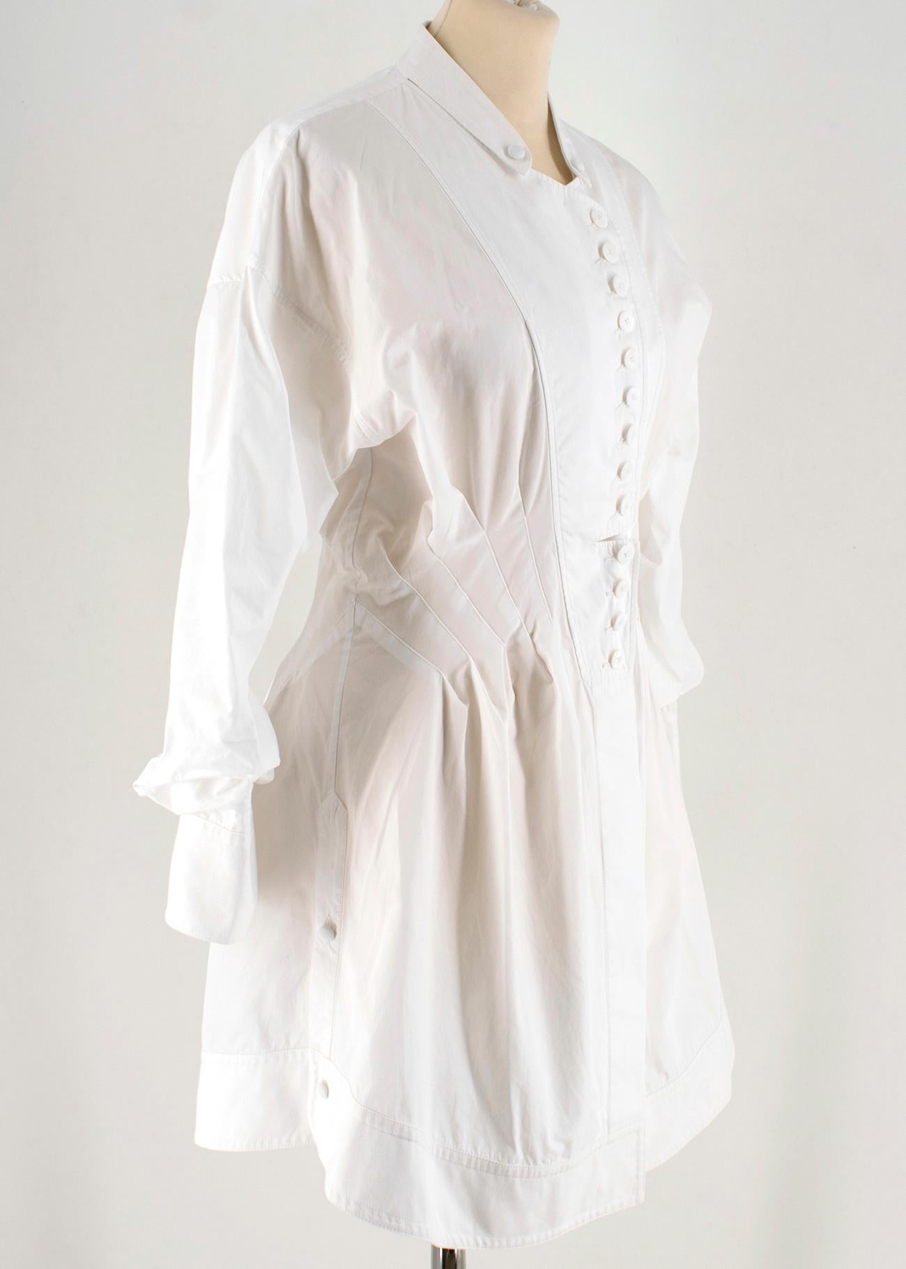 Alexander Wang White Button Down Tunic W/ Mandarin Collar

- white cotton long shirt 
- gathered sleeves
- round neckline 
- button down fastening to the front
- waist accent 

Please note, these items are pre-owned and may show some signs of