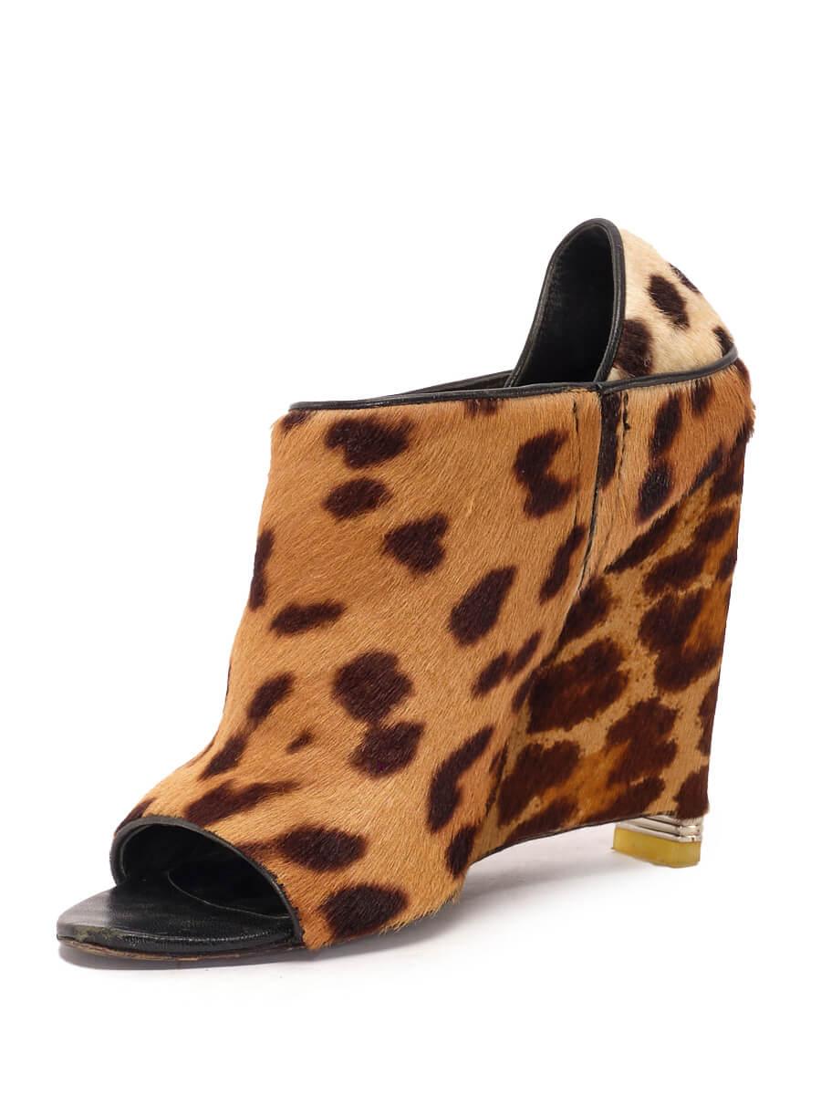 CONDITION isVery good. Minimal wear to shoes is evident. Scuffing to front of shoes, wear to heels is seen on this used Alexander Wang designer resale item.   Details  Brown Pony hair Leather Peep toe Wedge heel Slip on fastening Leopard print
