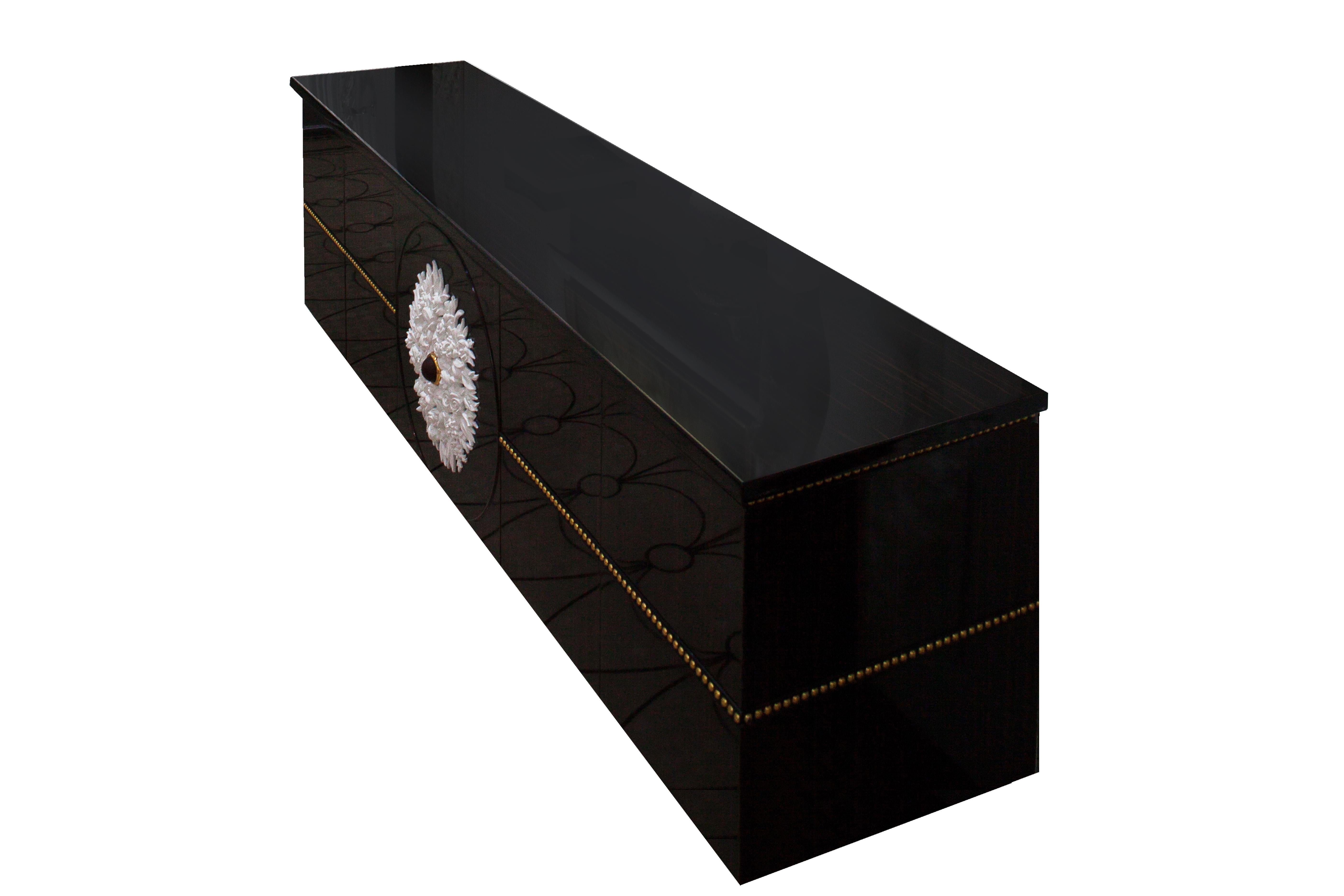 Dresser in Ebony Wood with White Flower Carving, Gold Leaf, Neoclassical Revival
Alexander's Collection White & Ebony Dresser from Art Furniture collection is a stunning addition to any bedroom. Crafted from high-quality materials, this dresser