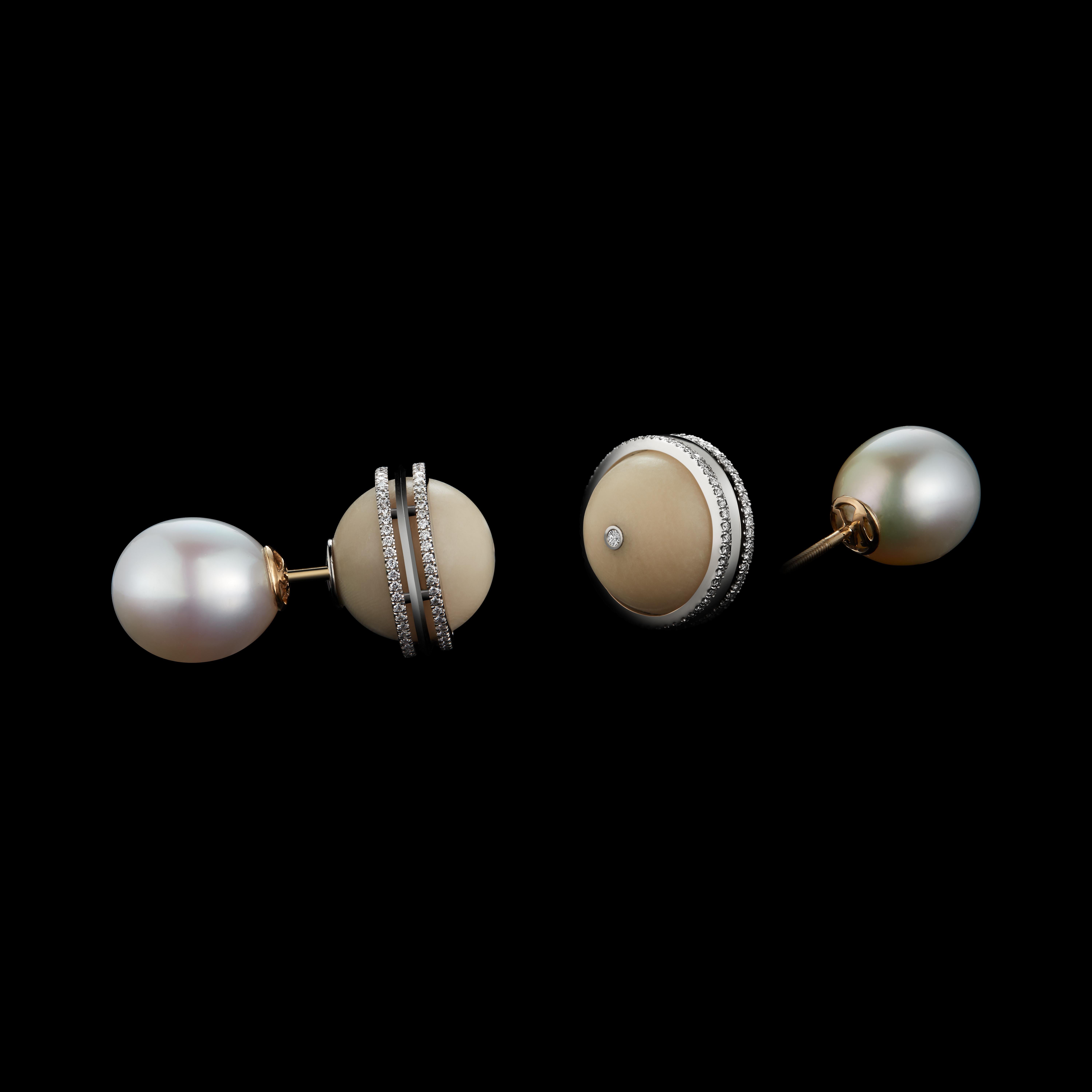 An Alexandra Mor One-Of-a-Kind double-sided stud earring featuring a pair of South Sea Pearls and 25.22 carats of Tagua Beads. Platinum set on 18 KY Gold Alexandra Mor logo gallery with Alexandra Mor's signature details of 1mm kinfe edged wire and