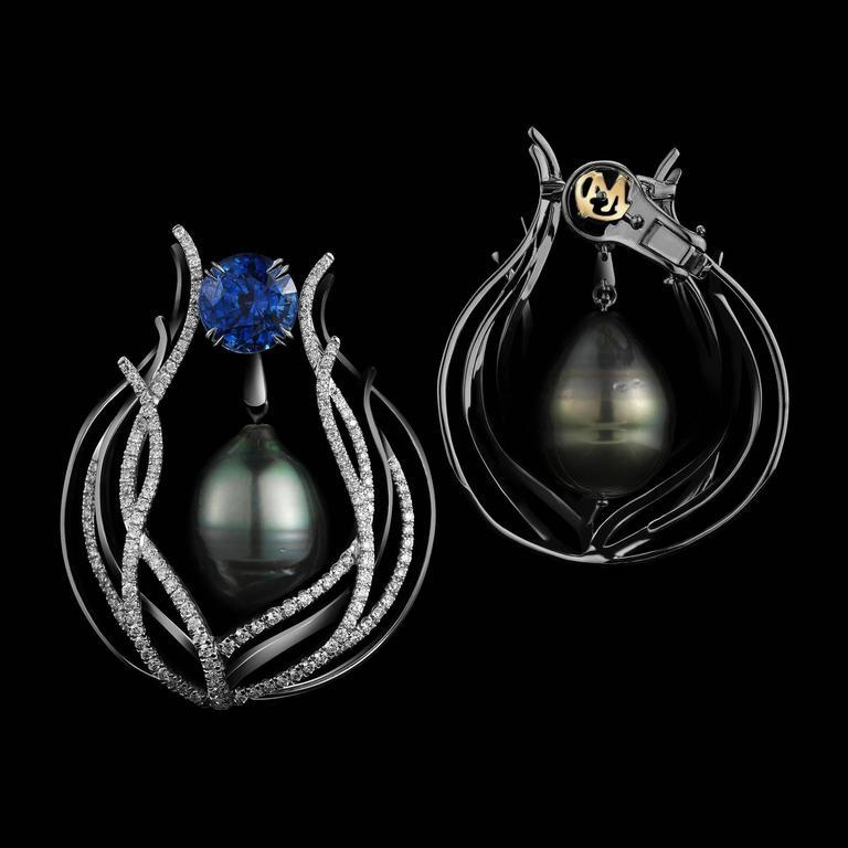 A pair of Alexandra Mor one-of-a-kind curved earrings suspended by Brilliant-cut Sapphire studs weighing 6.34 carats.  Dangling Pearls are framed by upward curving branches of Alexandra Mor signature knife-edged wire and 349 Diamond melee weighing