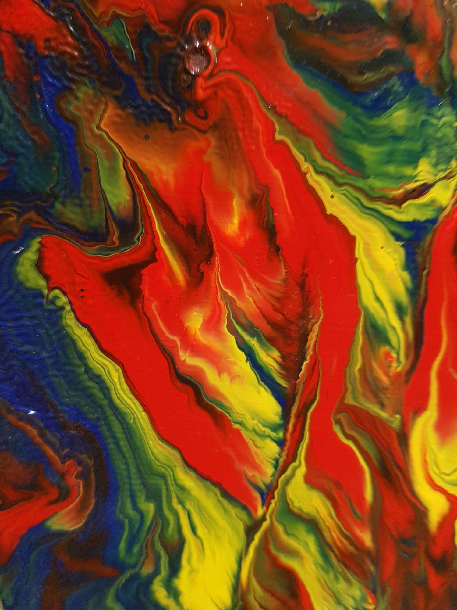 A vibrant abstract expressionist painting with a beautiful high gloss finish and unique textures, Primary Flames of Passion is a work of art that presents an emotion of passion. The painting falls into the 