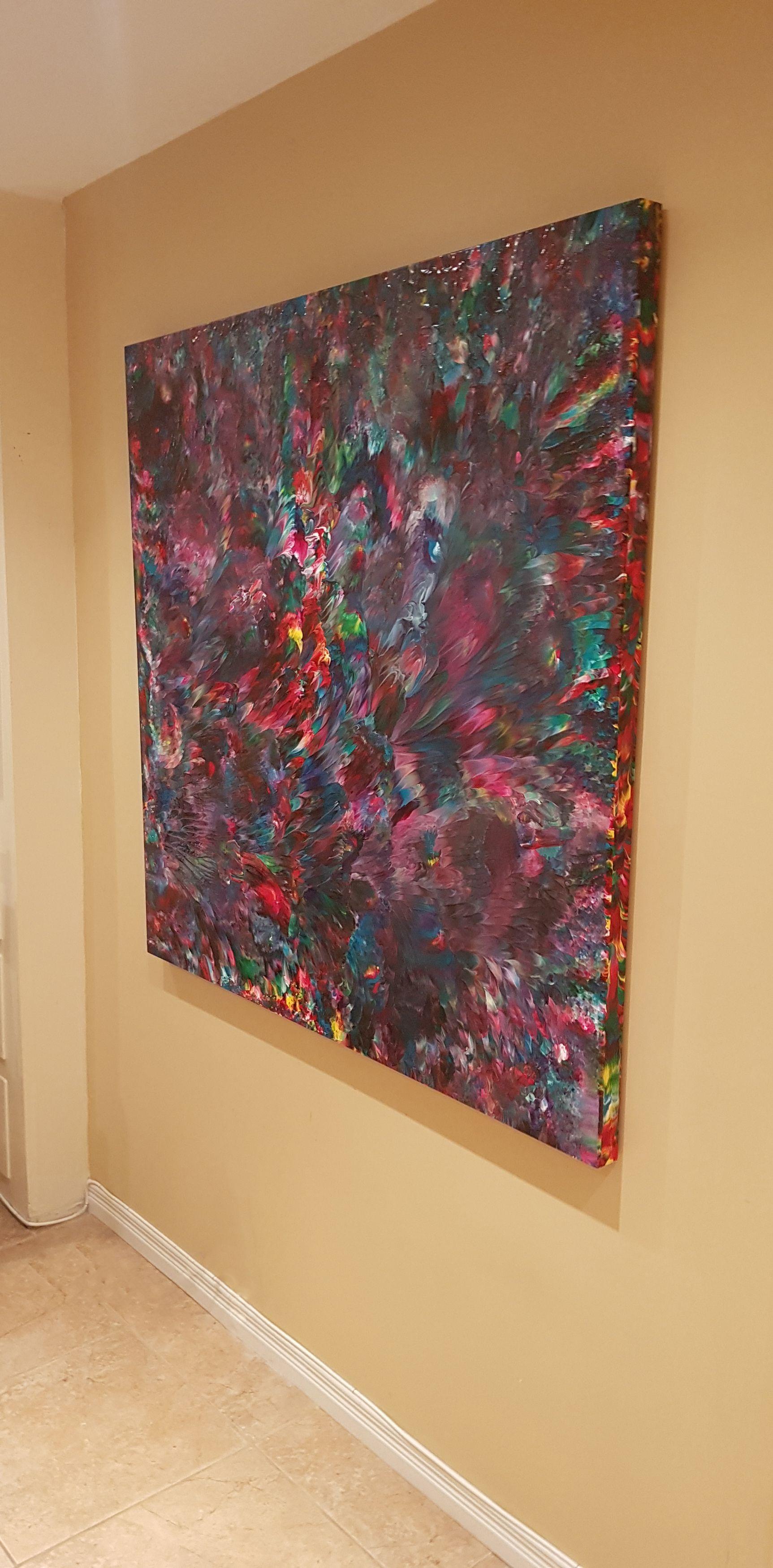This large, expressive abstract painting is a beautiful combination of rich red-violet and dark, deep violet colors. Dark blues and vibrant accent colors, mainly red, pink, yellow, and green, flow together with interesting textures and a high-gloss