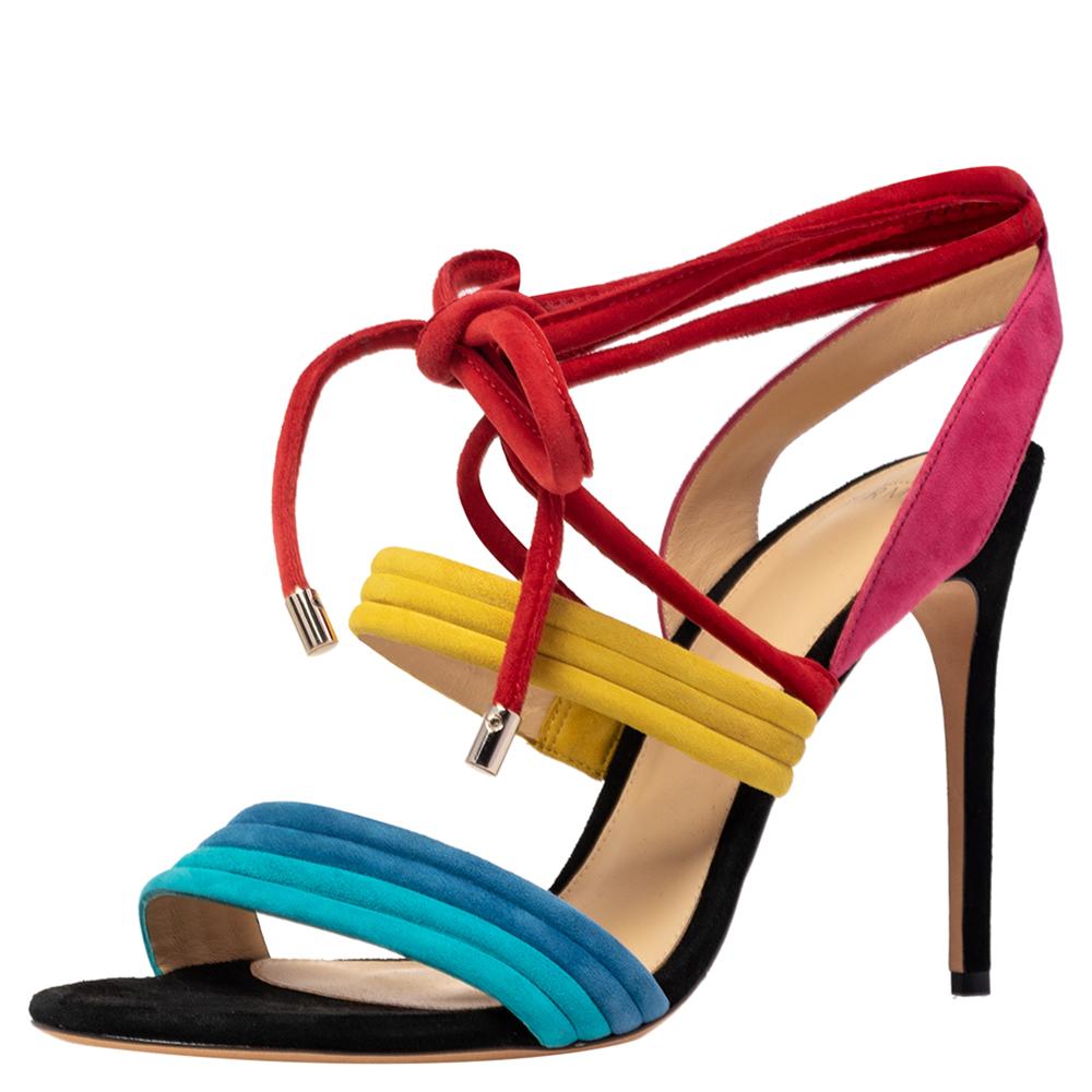 These Aurora sandals by Alexandre Birman bring a fashionable look. Crafted from suede, they come with multiple colorful straps and ankle wrap ties. Lined with the finest quality leather and lifted on 10 cm heels, they are pretty and stylish.

