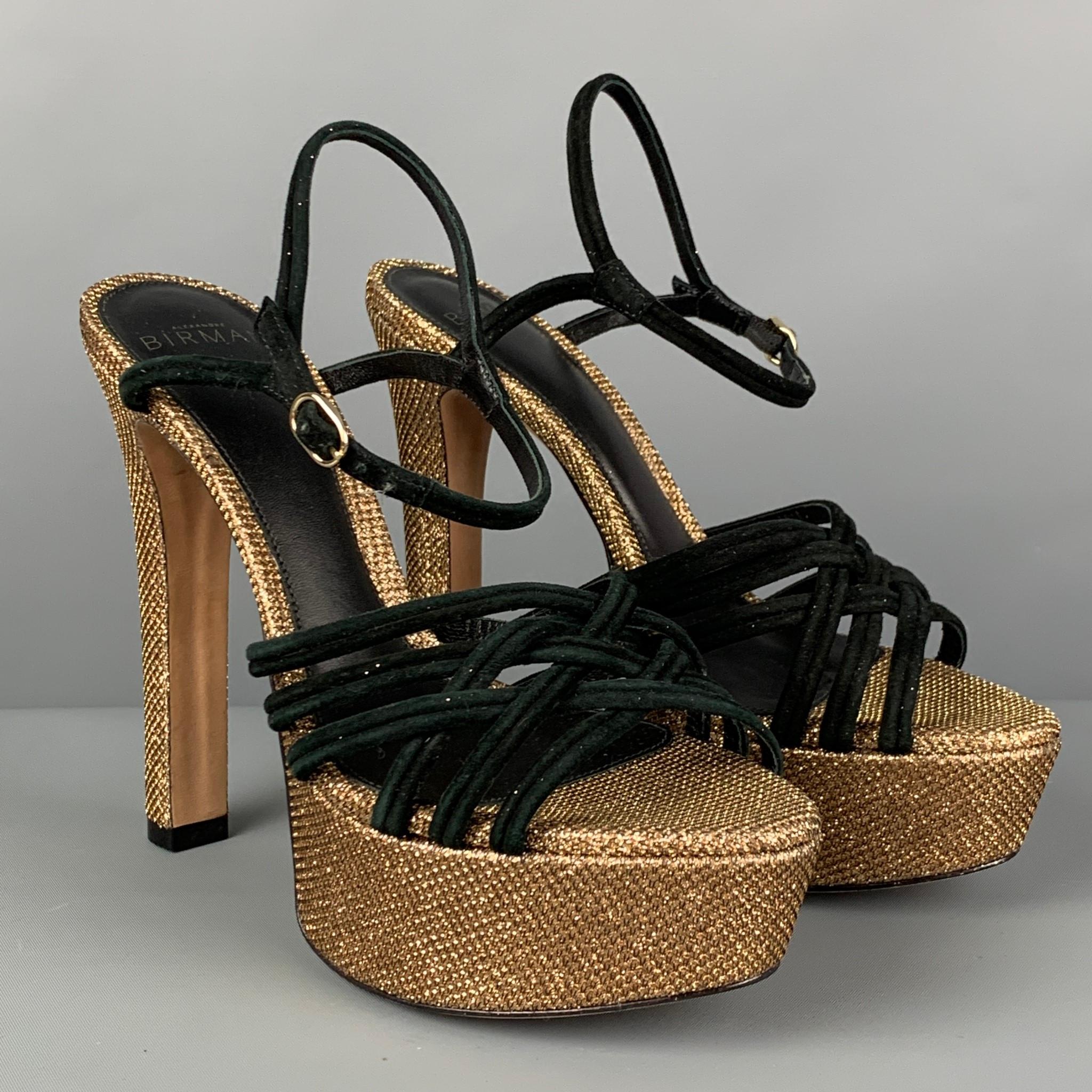 ALEXANDRE BIRDMAN pumps comes in a gold 'Vicky Crystal' design featuring black suede straps, platform, and a ankle strap closure. Includes box. 

Very Good Pre-Owned Condition. Minor discoloration a straps.
Marked: 37

Measurements:

Heel: 5