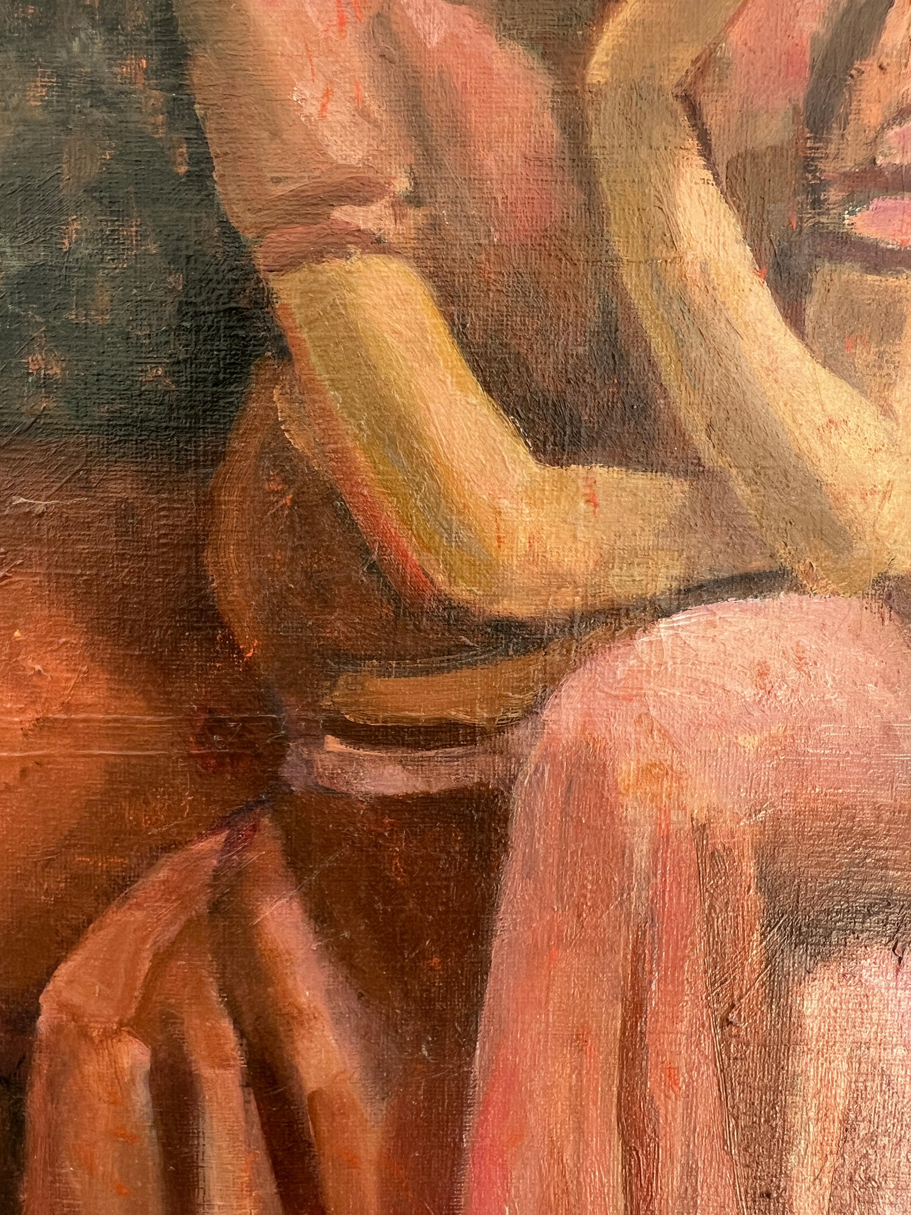 Giovane donna seduta nello studio di un artista 1