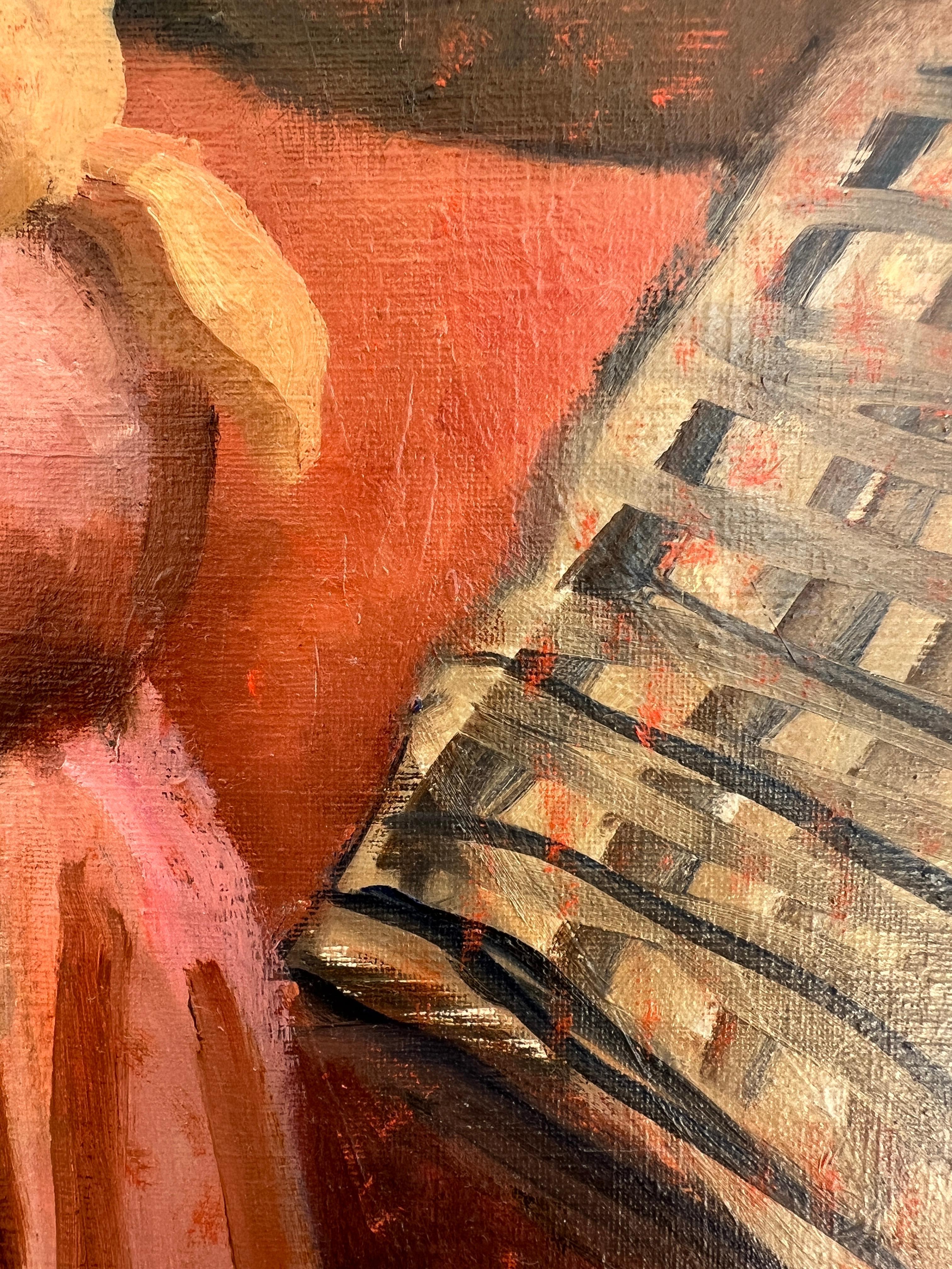 Giovane donna seduta nello studio di un artista 2