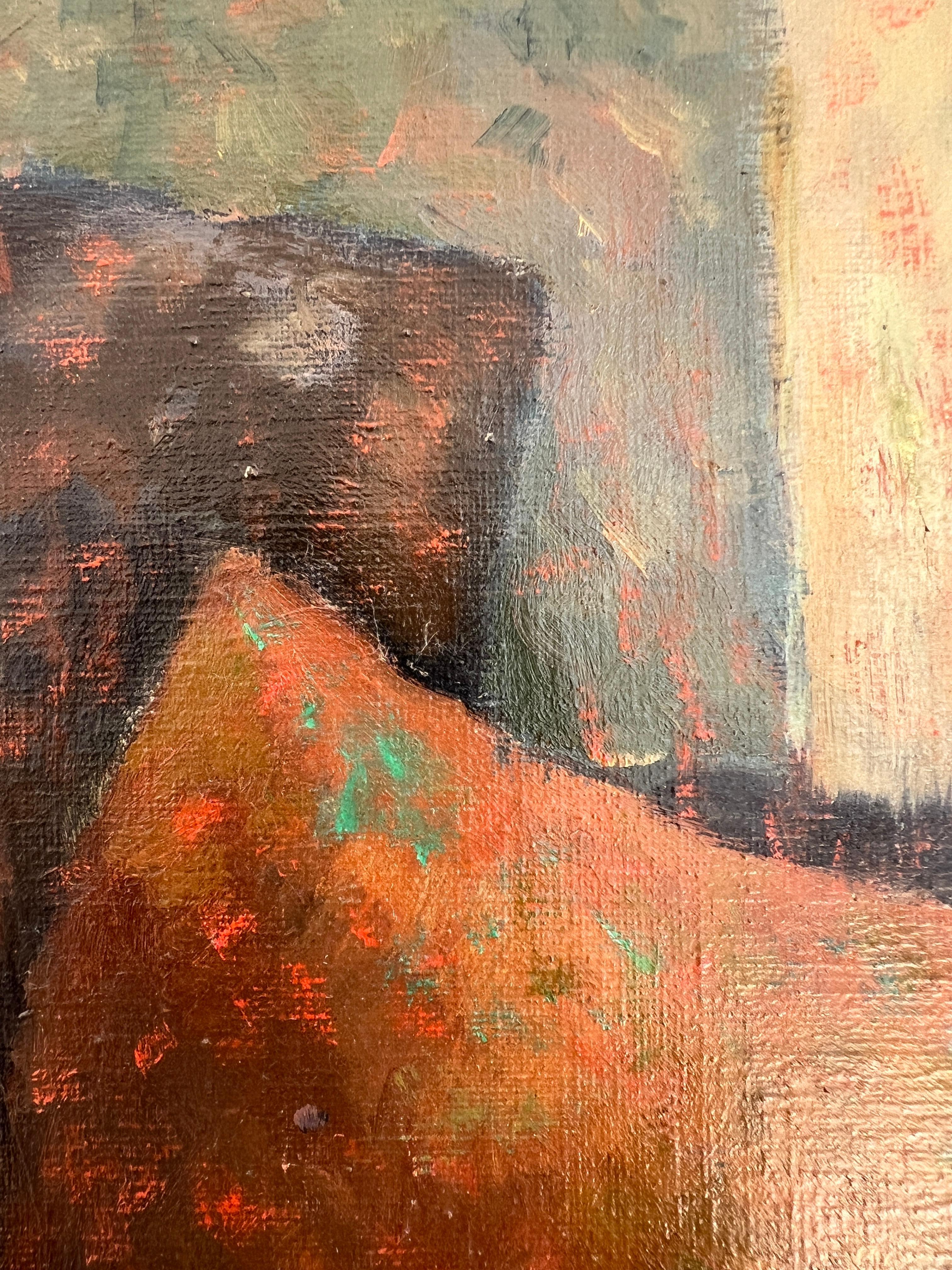 Giovane donna seduta nello studio di un artista 3