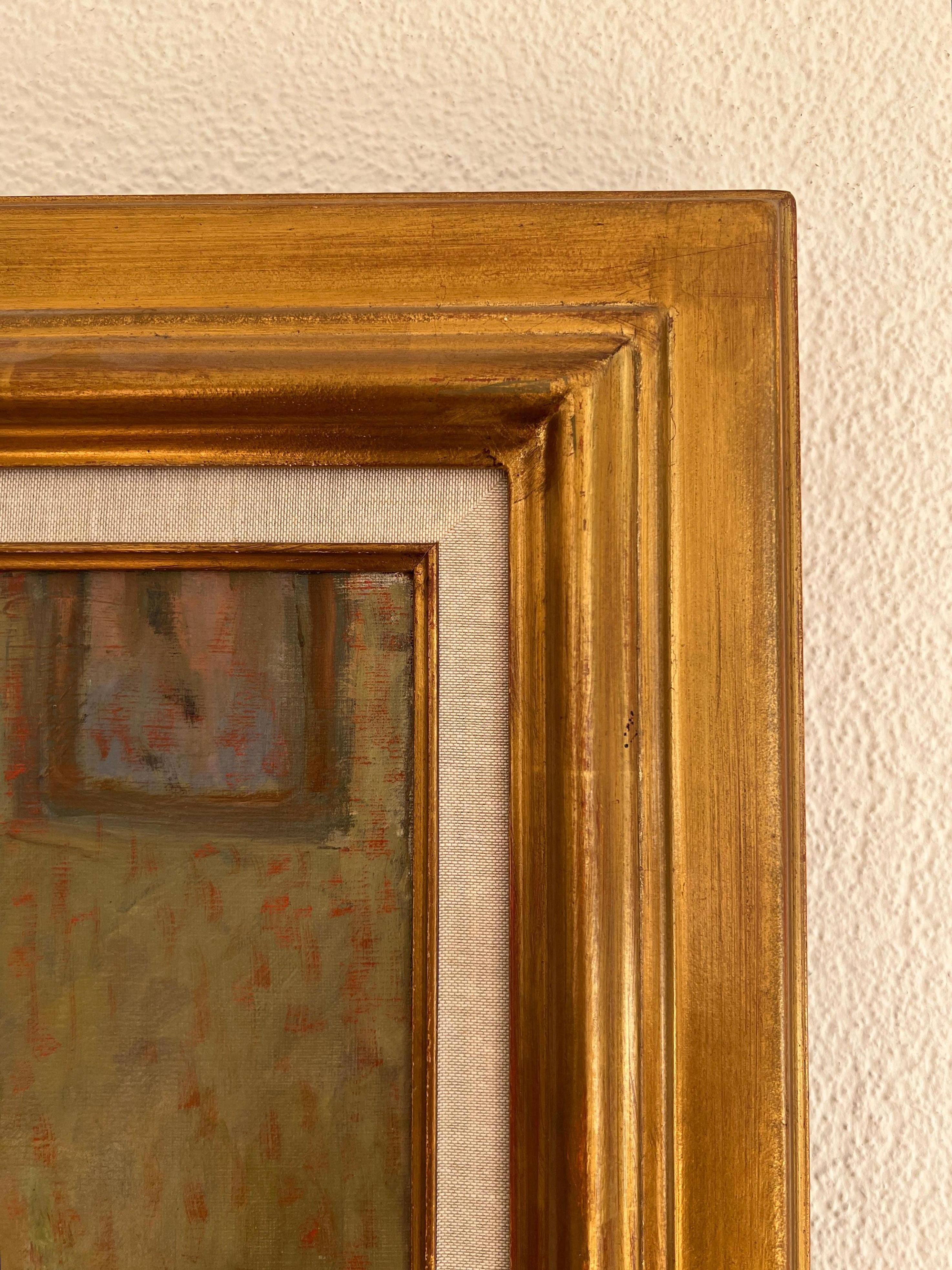 Giovane donna seduta nello studio di un artista 5