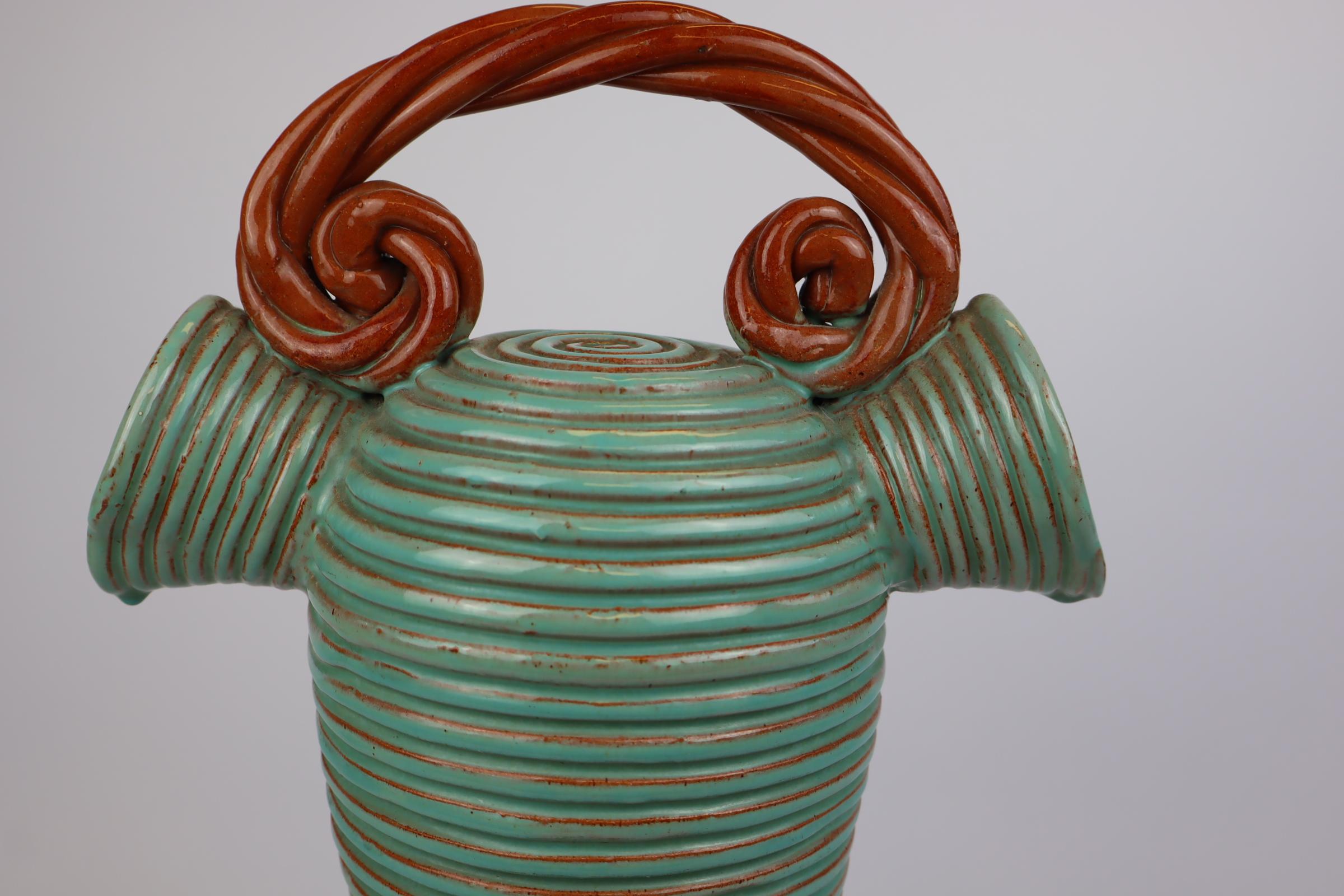 maravilloso jarrón de cuerda doble decantador de la 
artista ceramista belga Alexandre de Wemmel (1909-1964)

Cerámica esmaltada y torneada a mano.
Turquesa y marrón.

Buen estado