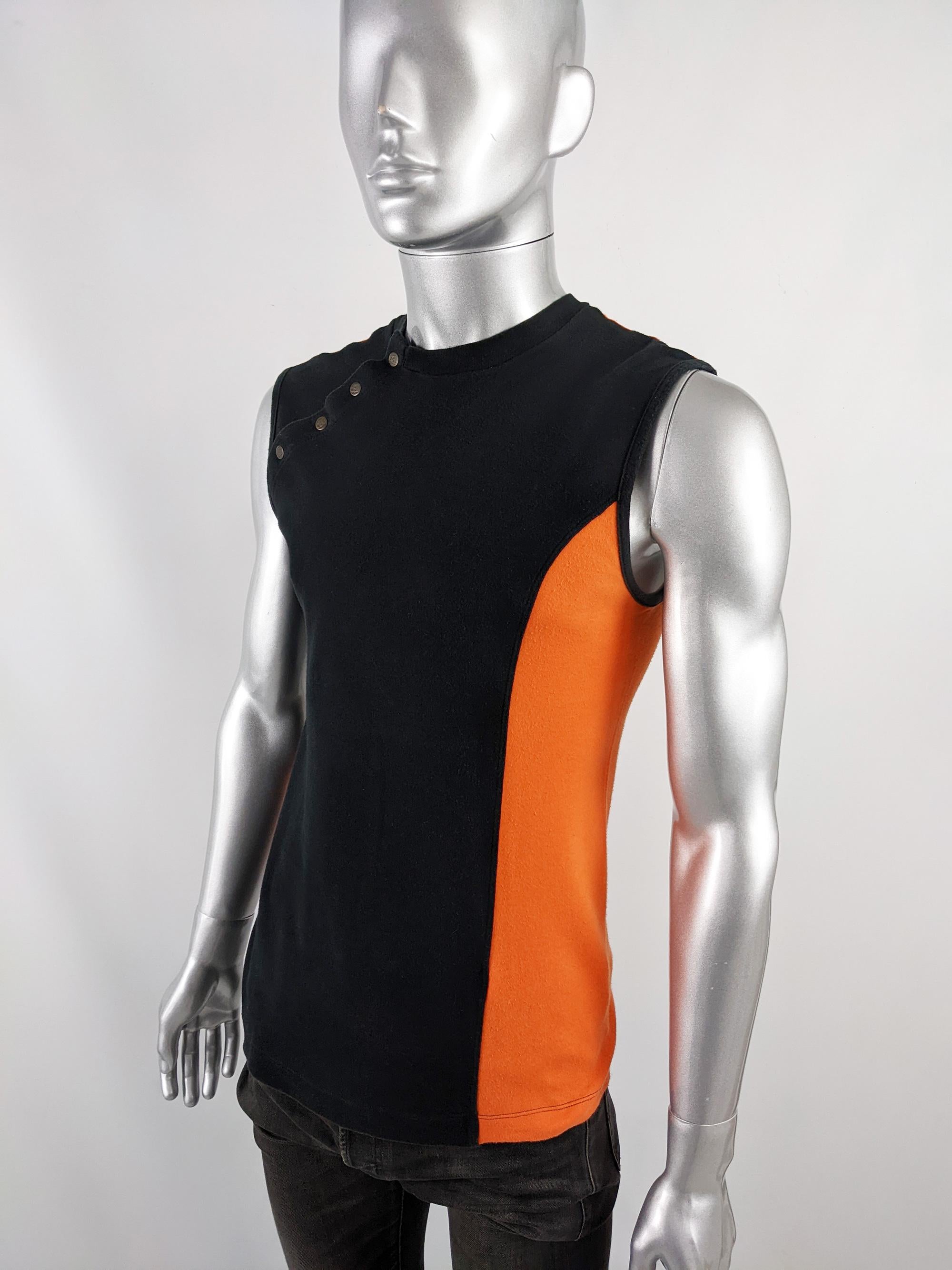 A sexy vintage mens sleeveless tshirt from the late 90s/ early 2000s by iconic Brazilian fashion designer, Alexandre Herchcovitch, know for his avant garde designs and cult clubwear clothing. This tank top is a great example, with his skull emblem