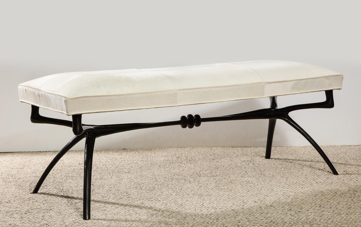 Made to order. Highly sculptural bench made out of cast bronze and upholstered with customer's own material. Please note that this bench comes in different sizes. Lead time: 20-24 weeks. C.O.M. Fabric: 2 yards. C.O.M. Leather: 1 hide. (1 hide = 55