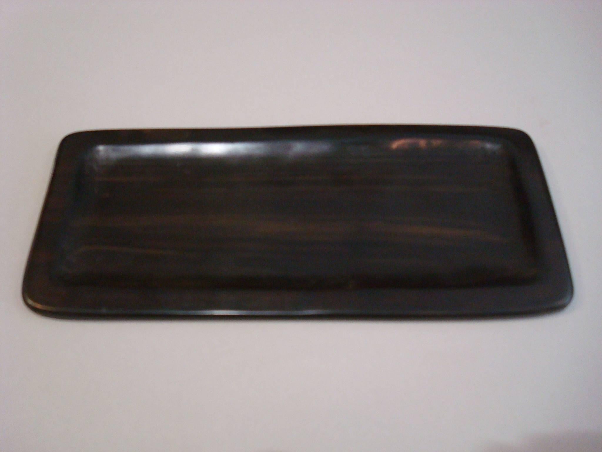 Mid Century Alexandre Noll ebony wood hand carved jewelry, cards plate.
Made in France, 1950s.