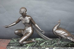 Alexandre Ouline Scultura di donna con pavone