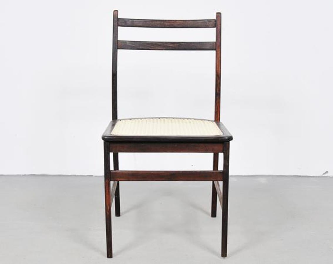 Beautiful and very rare vintage 1960s rosewood and straw chair from Brazilian artist and designer Alexandre Rapoport.