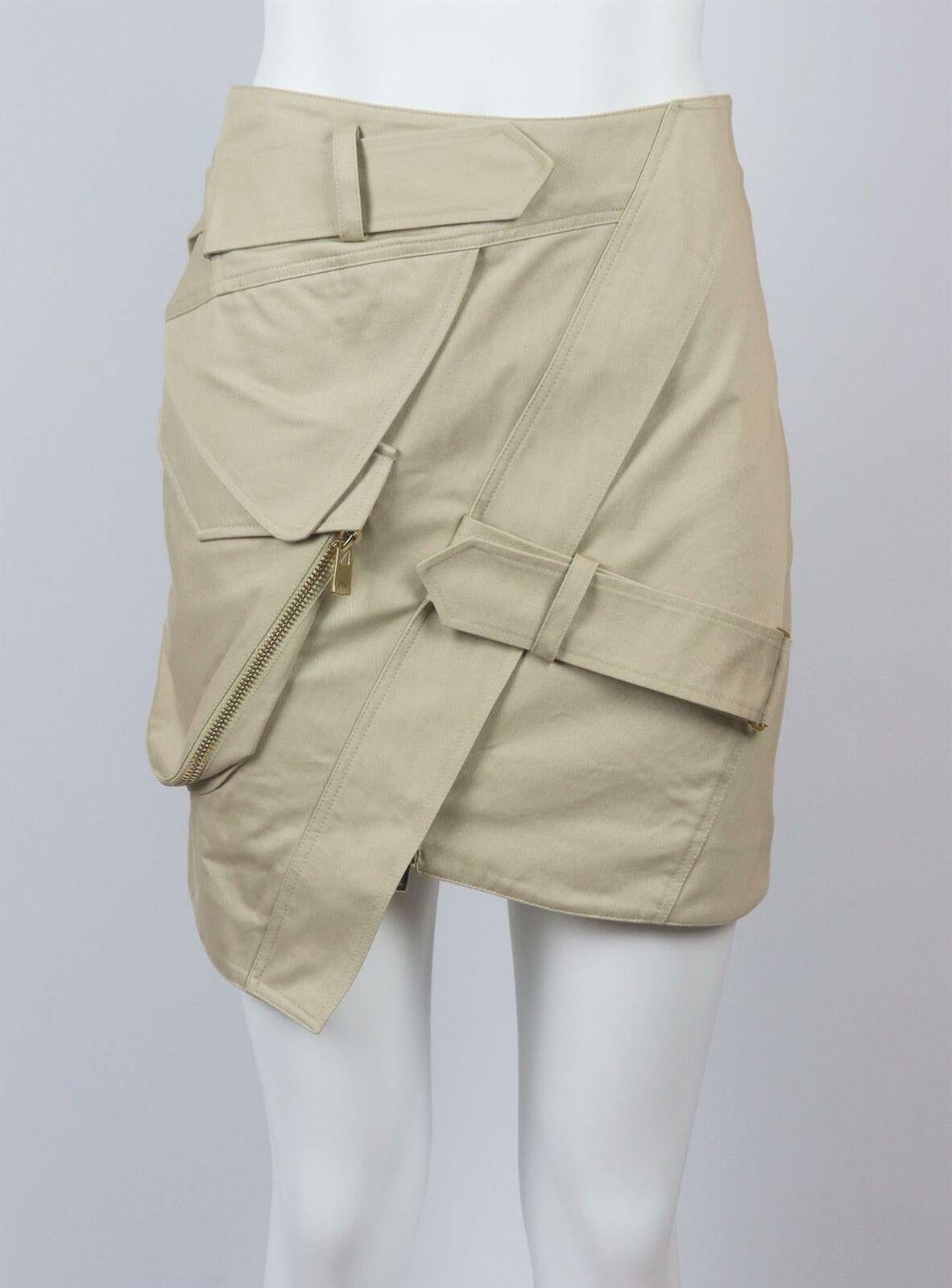 Alexandre Vauthier's mini skirt feels elevated thanks to its asymmetric hem, it's cut from cotton-twill in a wrap-effect silhouette that sits just above the hips.
Beige cotton-twill.
Concealed zip fastening at front.
100% Cotton.

Size: FR 38 (UK