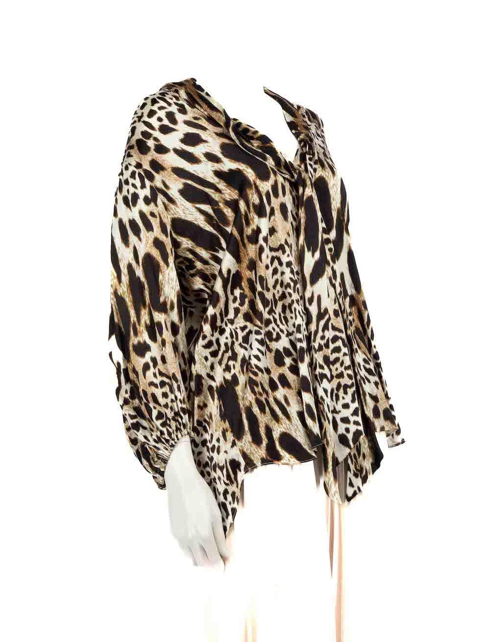 CONDITION is Very good. Hardly any visible wear to blouse is evident on this used Alexandre Vauthier designer resale item.
  
  Details
  Brown
  Silk
  Blouse
  Leopard print
  Long sleeves
  Elasticated cuffs
  Neck tie detail
  V-neck
  
  
 