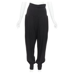 ALEXANDRE VAUTHIER COUTURE Pantalón negro plisado de talle alto con globo de barril