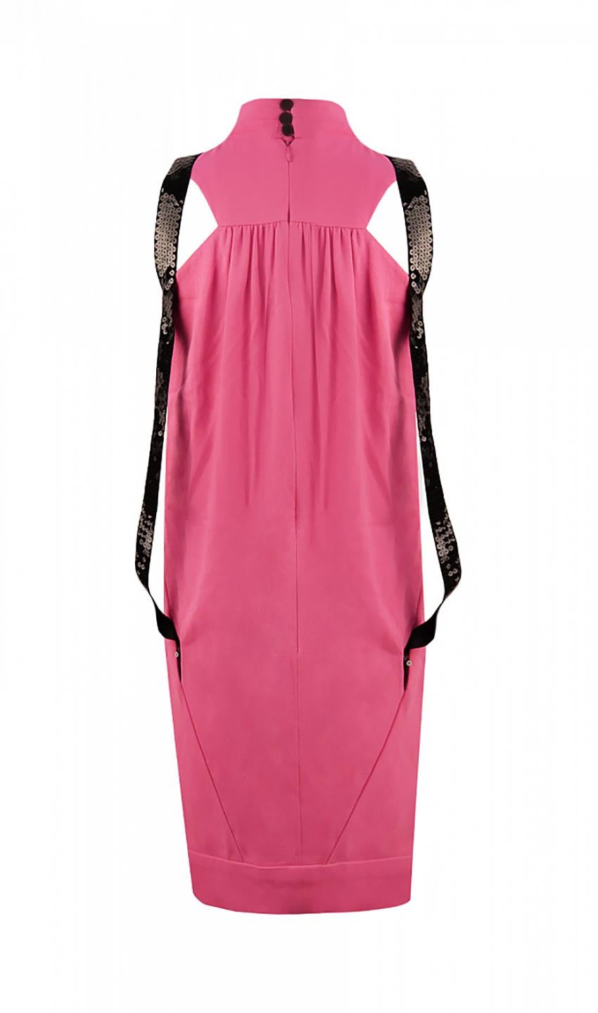 CHANEL

Chanel dress is made of pink light wool. 

Wide black straps are decorated with sequins, sleeveless. 

Stand-up collar, draped back and front. 

Zip closure and buttons on the back.

2008, France.


Content:  wool/silk

Size 36 - S

Bust: