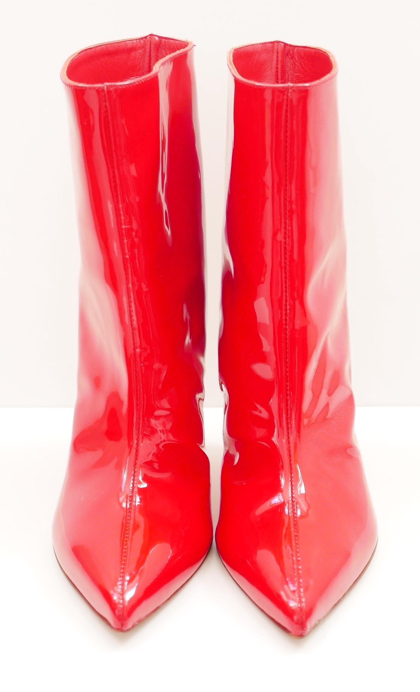 Super fierce Alexandre Vauthier Raquel 105 ankle boots. bought for £620 and worn once inside. Come with dustbag. Made from super glossy bright red patent leather, they have pointed toes, wide tops and stilettos heels. Have small, barely visible